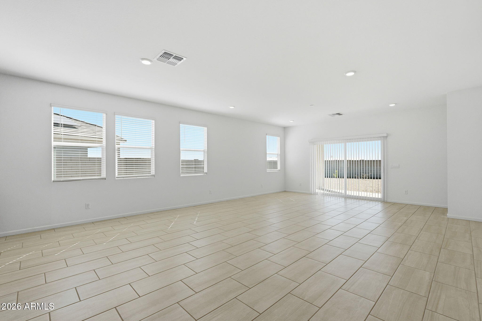 25489 West Fraktur Road Buckeye, AZ 85326 - Photo 18 of 39 a view of an empty room with a window