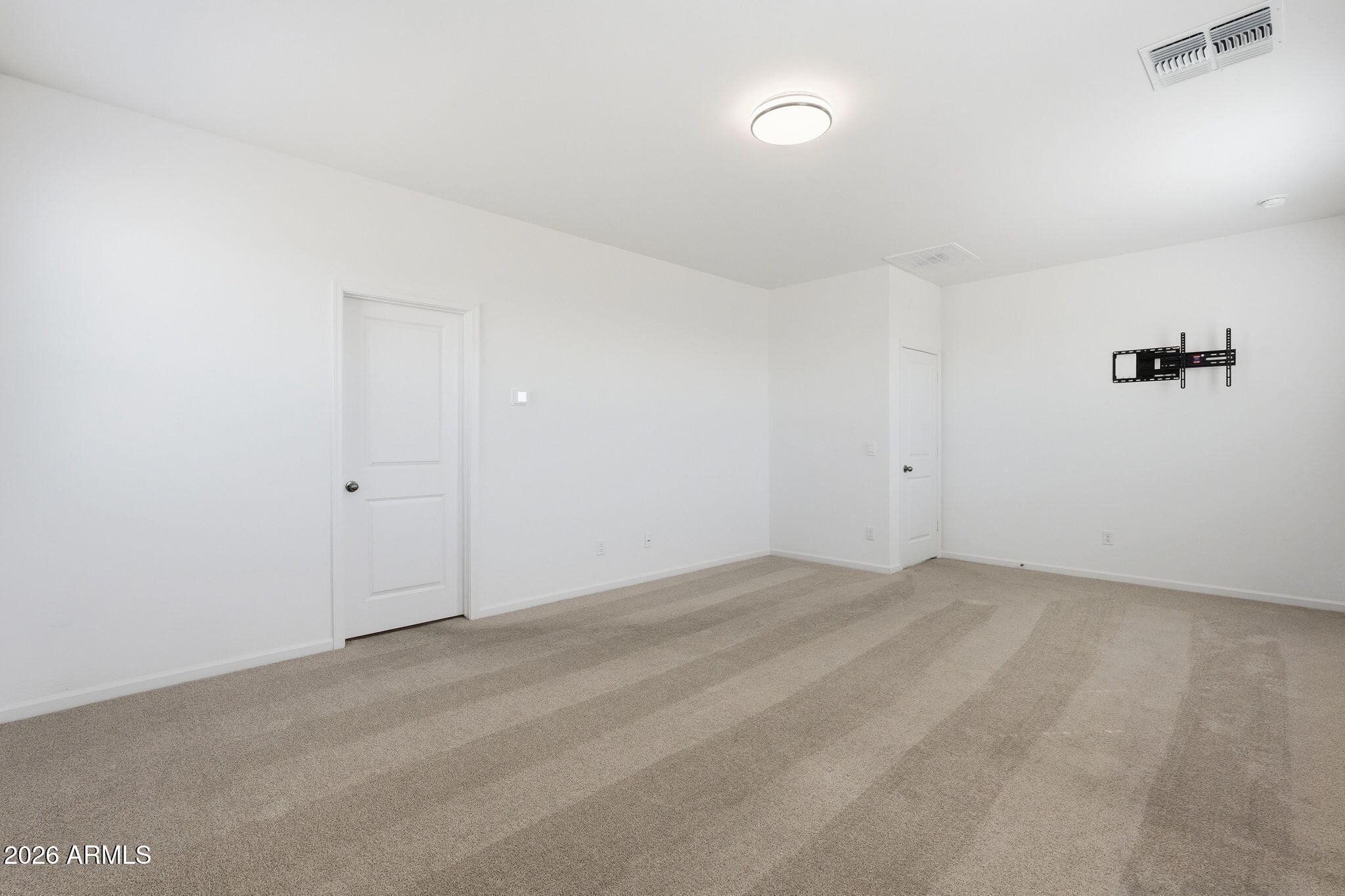 25489 West Fraktur Road Buckeye, AZ 85326 - Photo 23 of 39 a view of an empty room