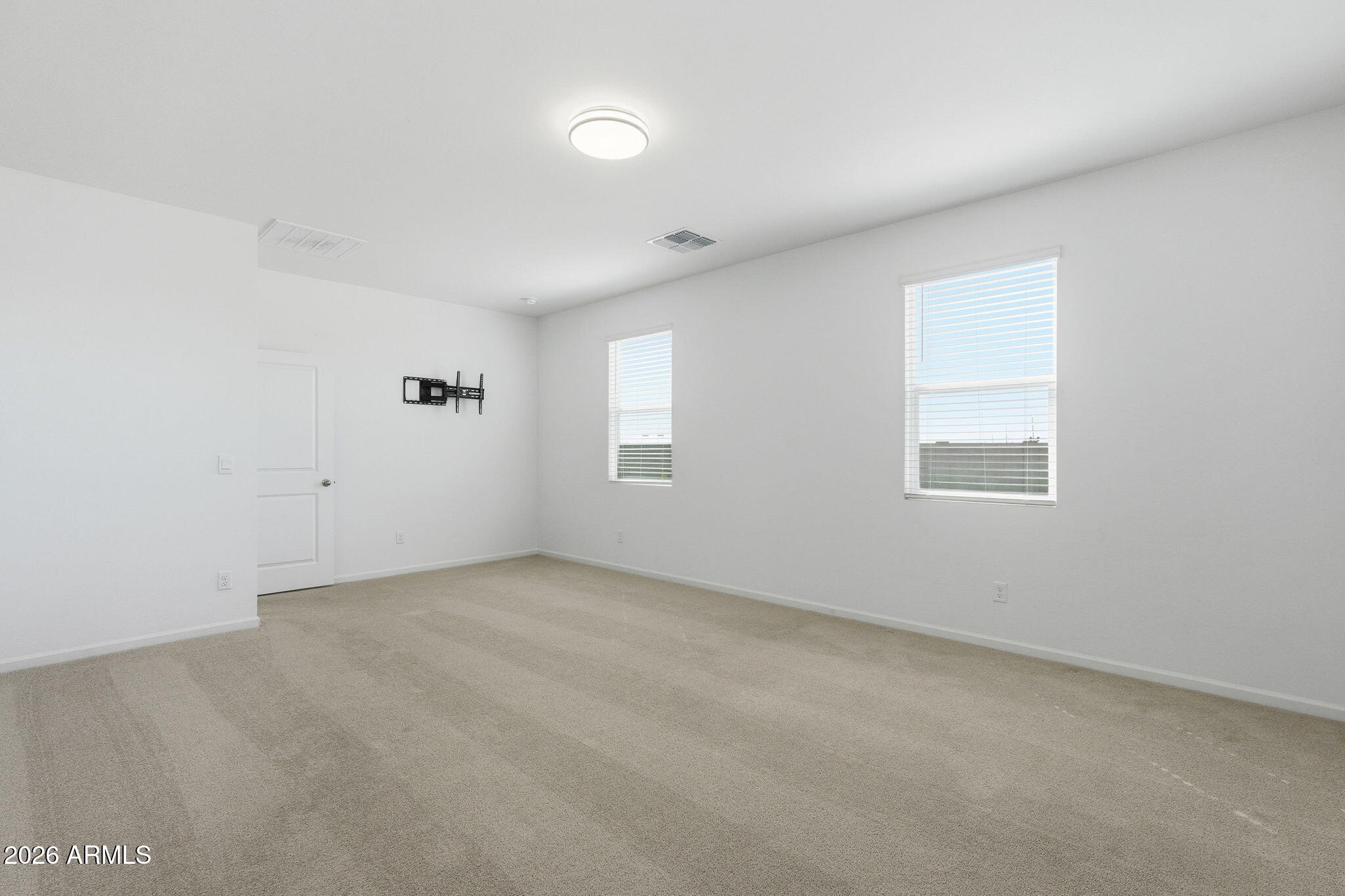 25489 West Fraktur Road Buckeye, AZ 85326 - Photo 24 of 39 an empty room with a window