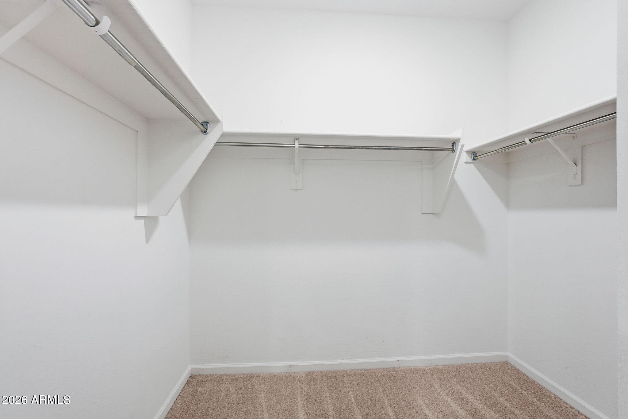 25489 West Fraktur Road Buckeye, AZ 85326 - Photo 27 of 39 a view of an empty walk in closet