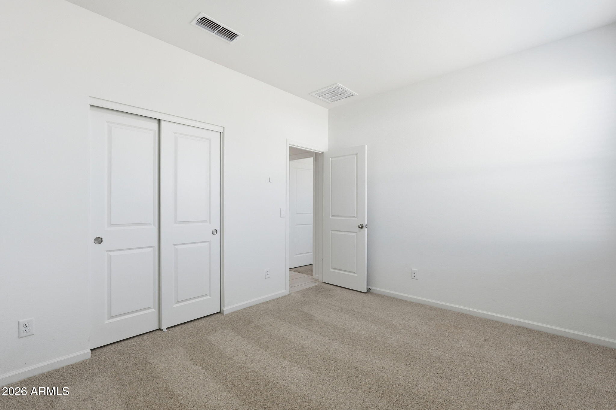 25489 West Fraktur Road Buckeye, AZ 85326 - Photo 32 of 39 a view of an empty room