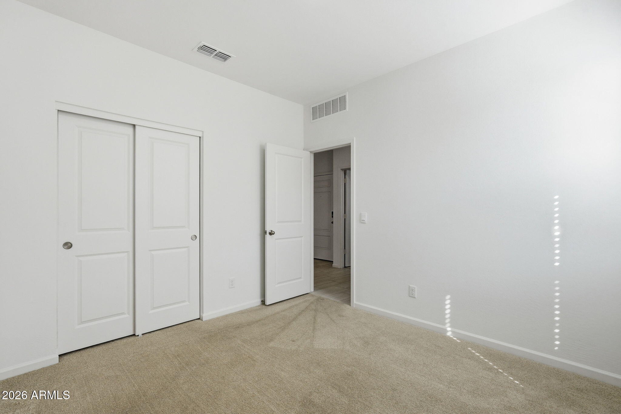 25489 West Fraktur Road Buckeye, AZ 85326 - Photo 10 of 39 a view of an empty room