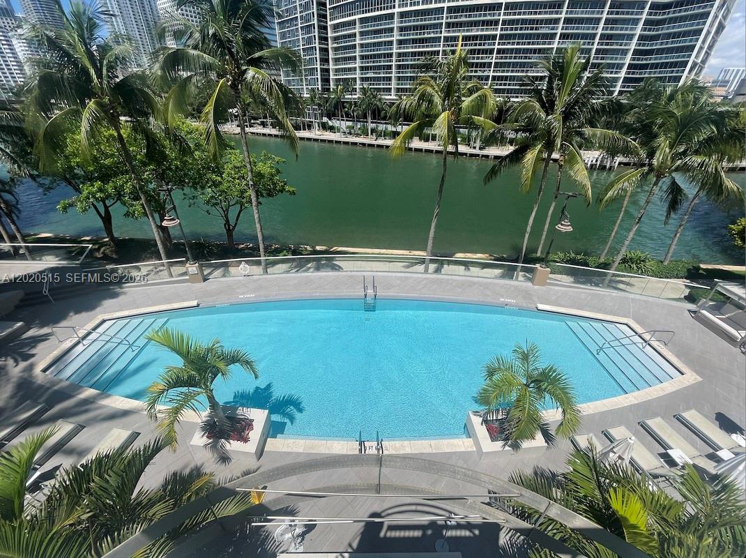 901 Brickell Key Boulevard, Unit 609 Miami, FL 33131 - Photo 22 of 27 Pool overlooking Biscayne Bay towards Brickell