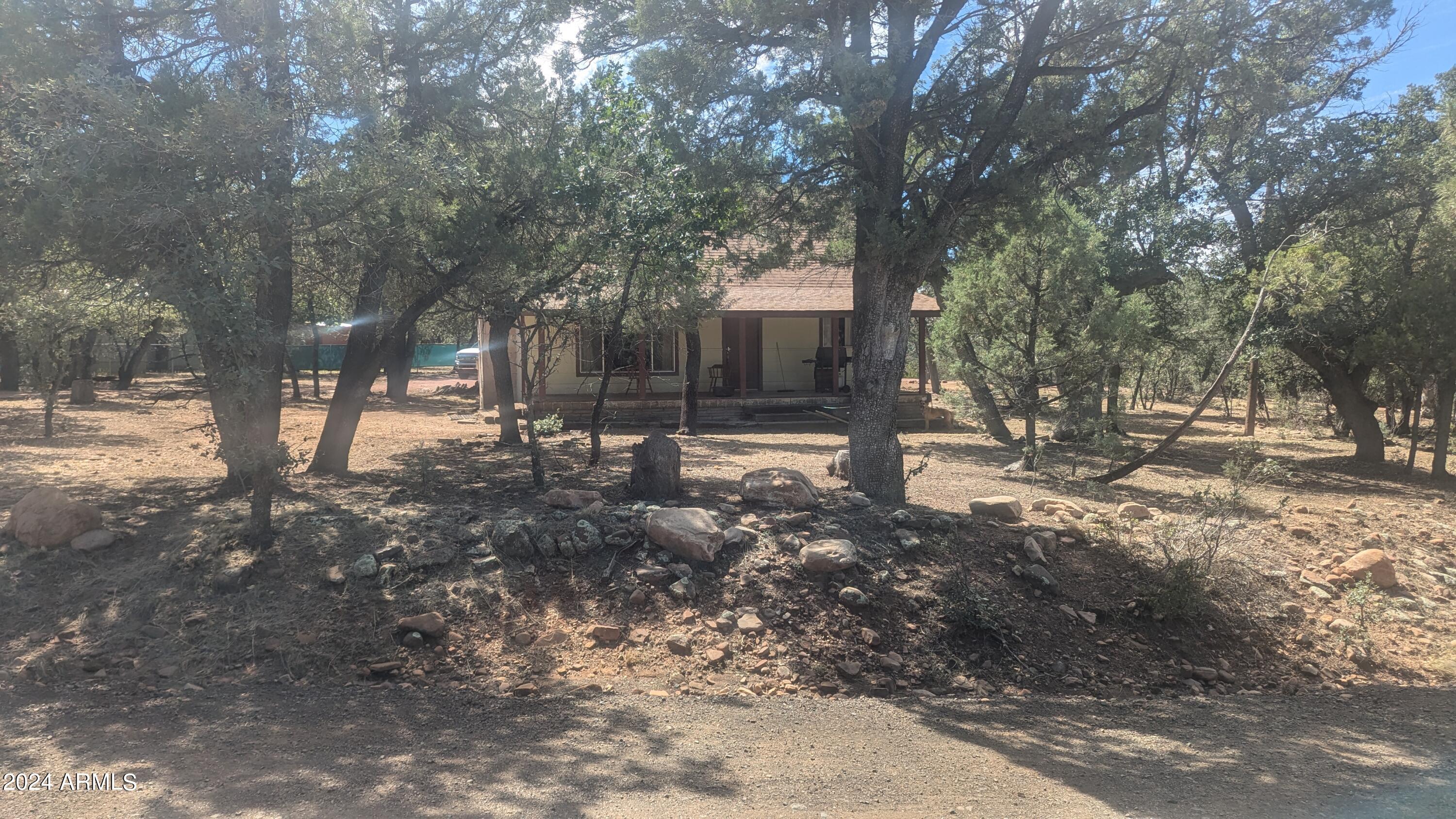 4838 Rim View Loop Strawberry, AZ 85544 - Photo 8 of 39 a view of outdoor space with trees
