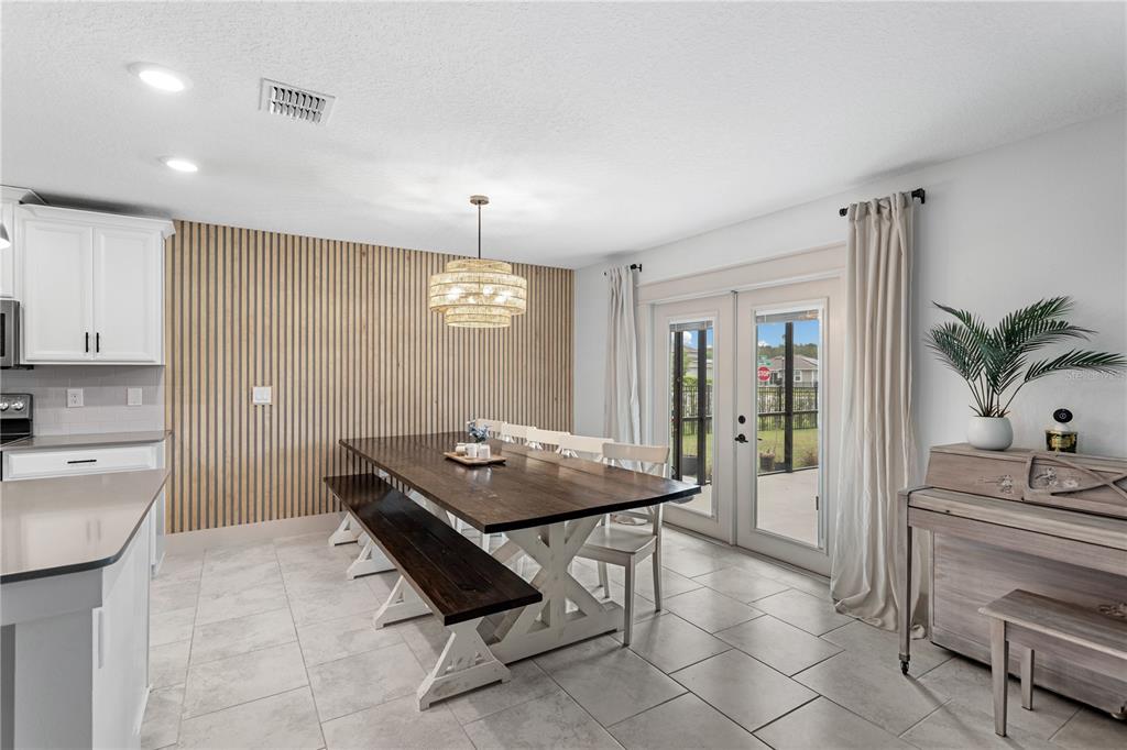 5693 Alenlon Way Mount Dora, FL 32757 - Photo 12 of 40 a room with furniture and window