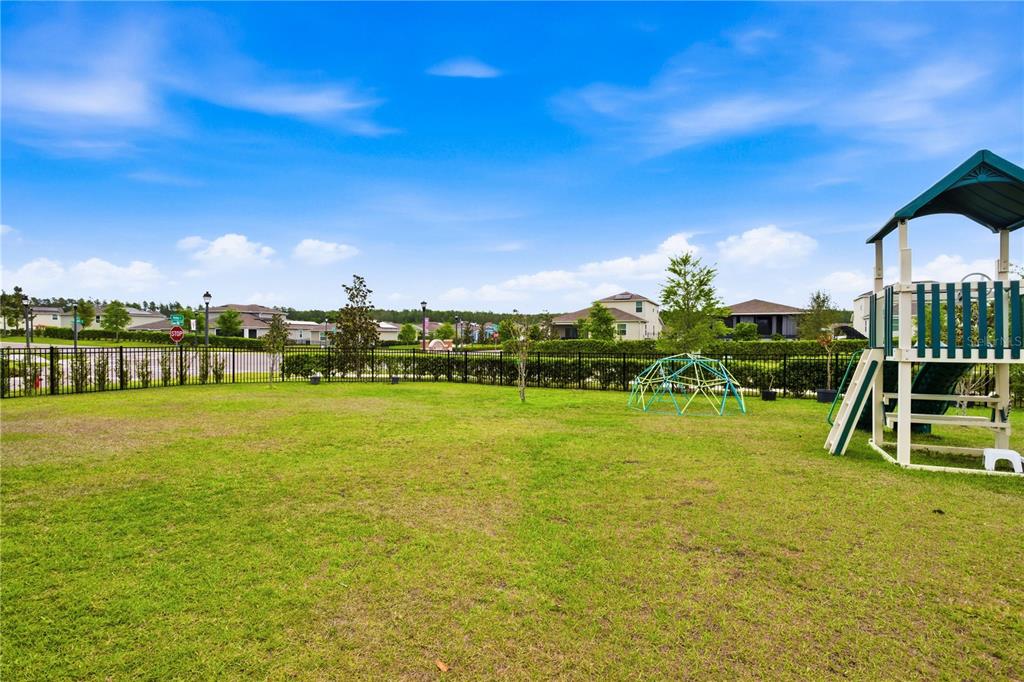5693 Alenlon Way Mount Dora, FL 32757 - Photo 37 of 40 a view of a lake with houses