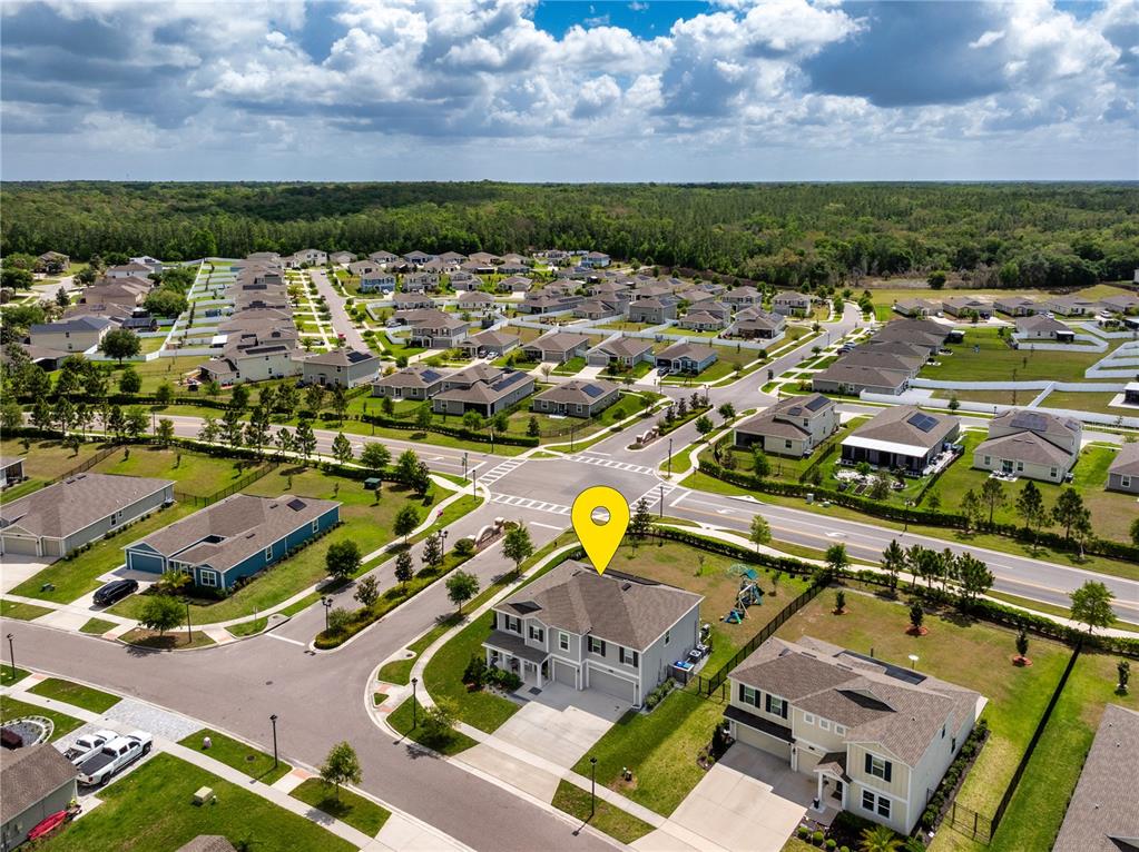 5693 Alenlon Way Mount Dora, FL 32757 - Photo 40 of 40 an aerial view of residential houses with outdoor space