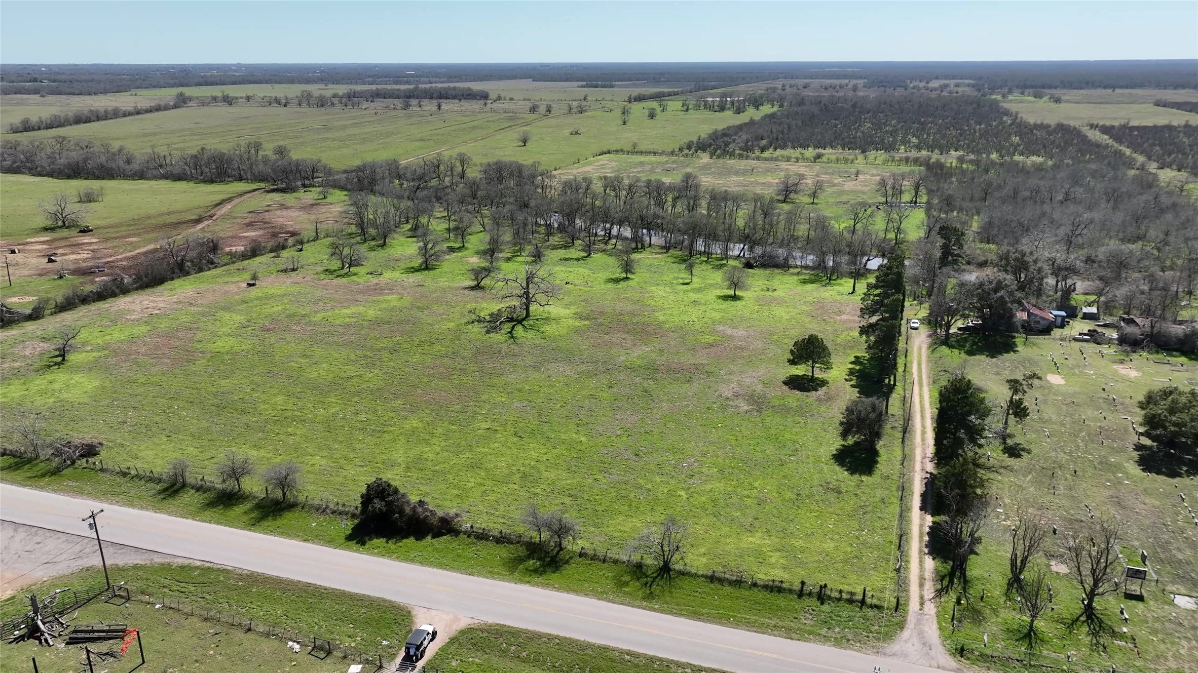 40365 Mt Zion Road Pattison, TX 77423 - Photo 15 of 41 a view of a lake with a mountain