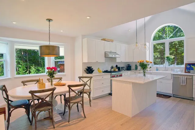 a view of a dining room with furniture window and outside view