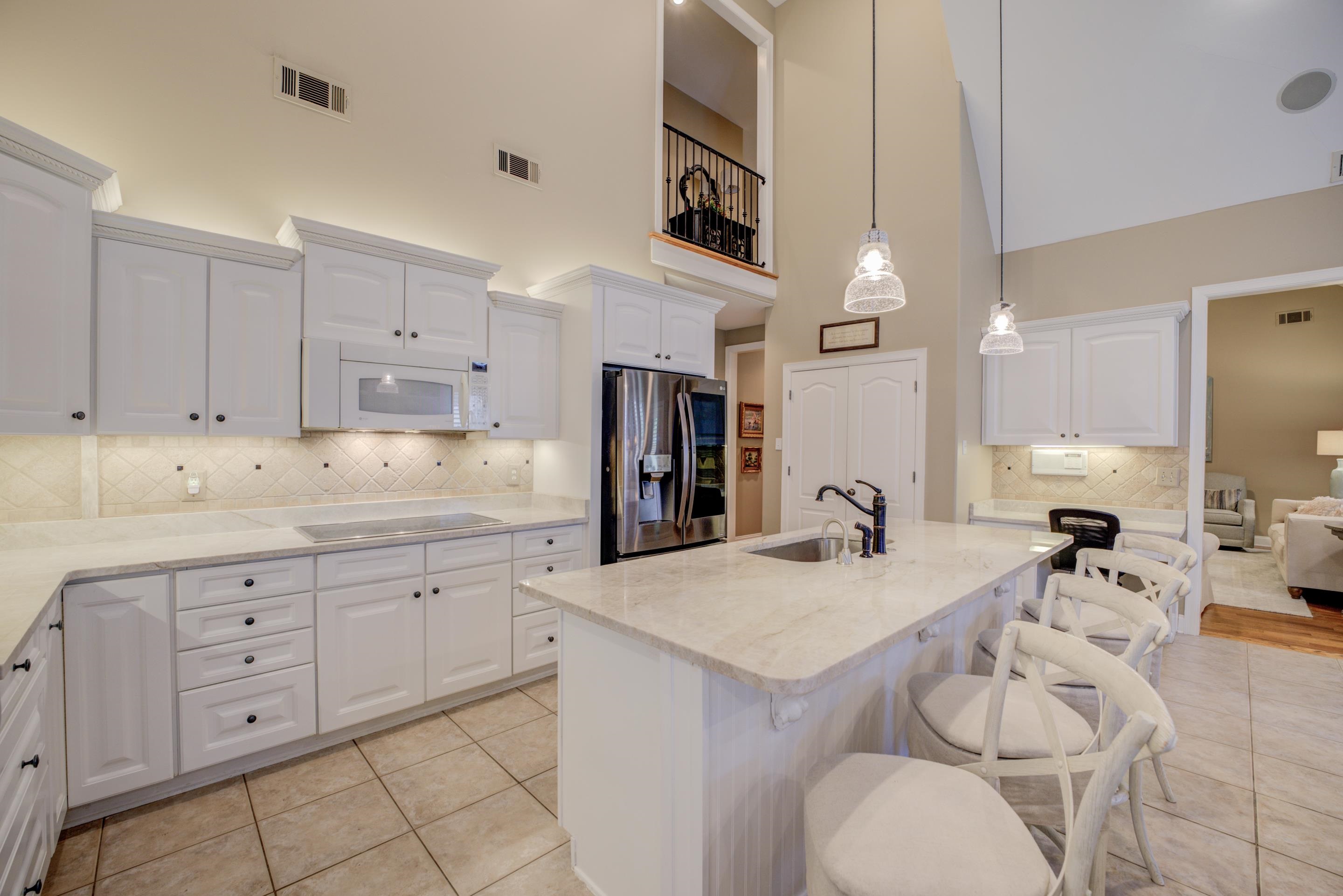 1238 Braystone Trail Collierville, TN 38017 - Photo 15 of 40 Induction cooktop, multiple pantries, large breakfast bar. Cute Juliet balcony at upstairs.