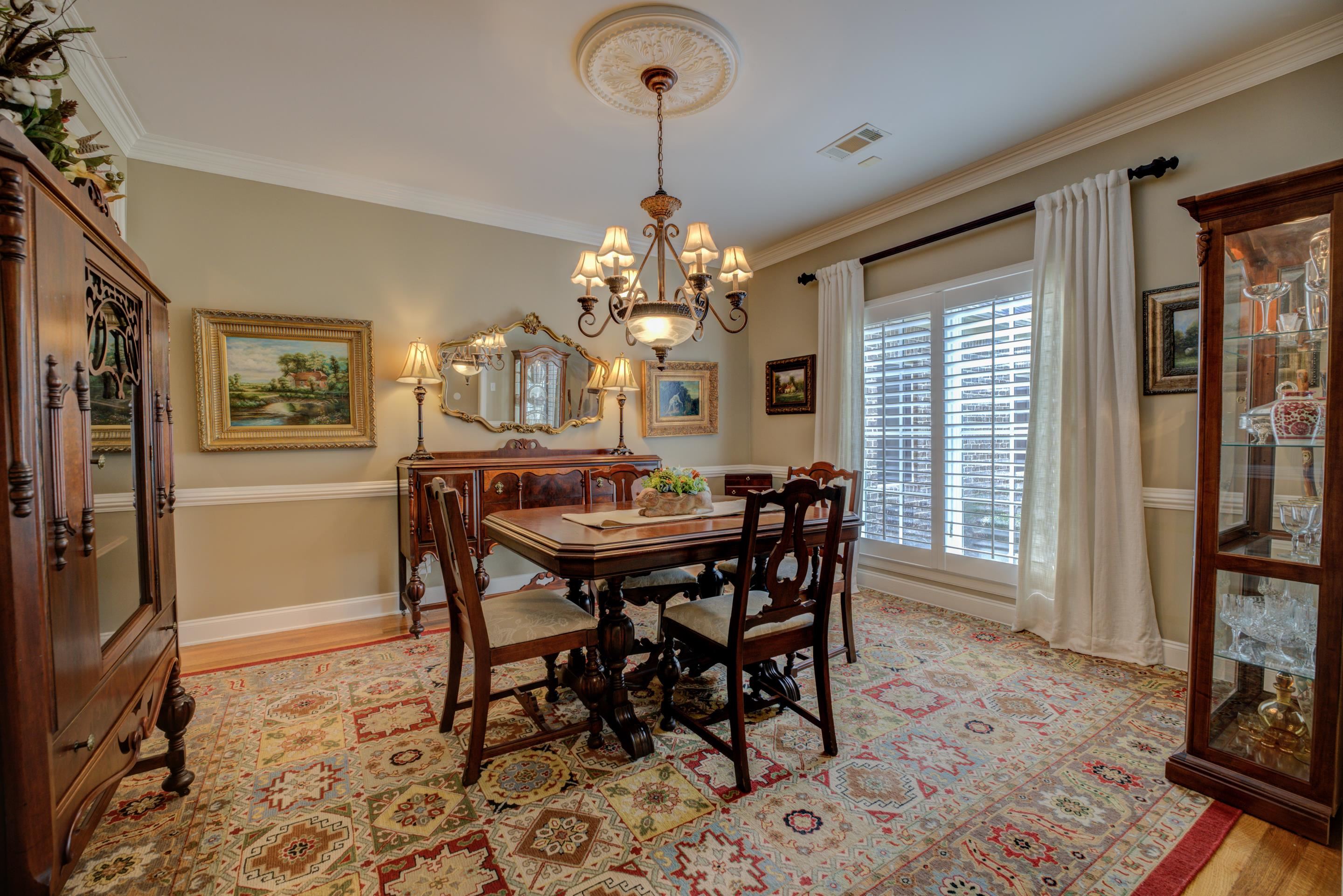 1238 Braystone Trail Collierville, TN 38017 - Photo 4 of 40 Formal dining room with hardwood floors, plantation shutters, adjacent to butler's pantry