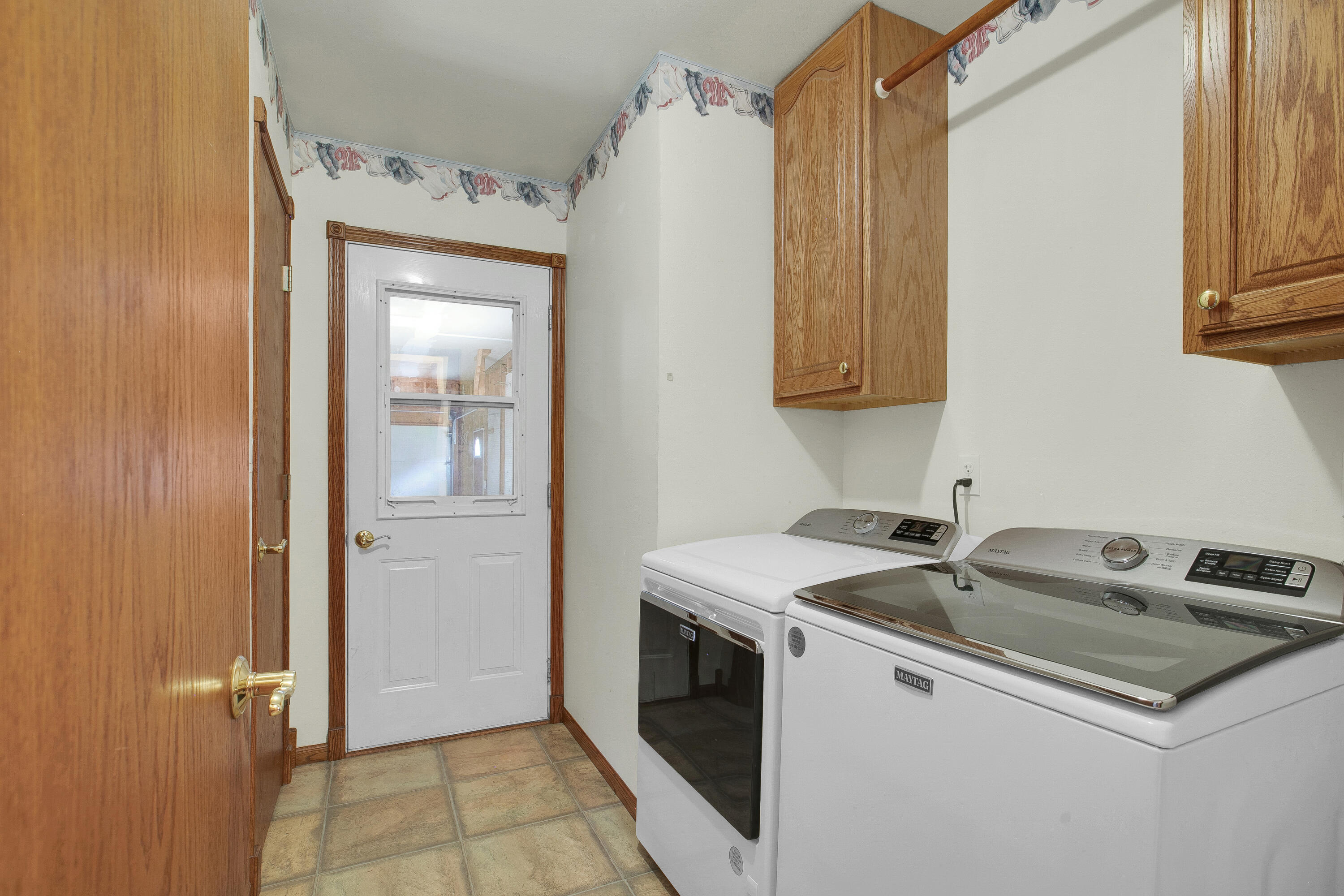 12120 Marken Road Meeme, WI 53042 - Photo 16 of 40 main floor laundry room