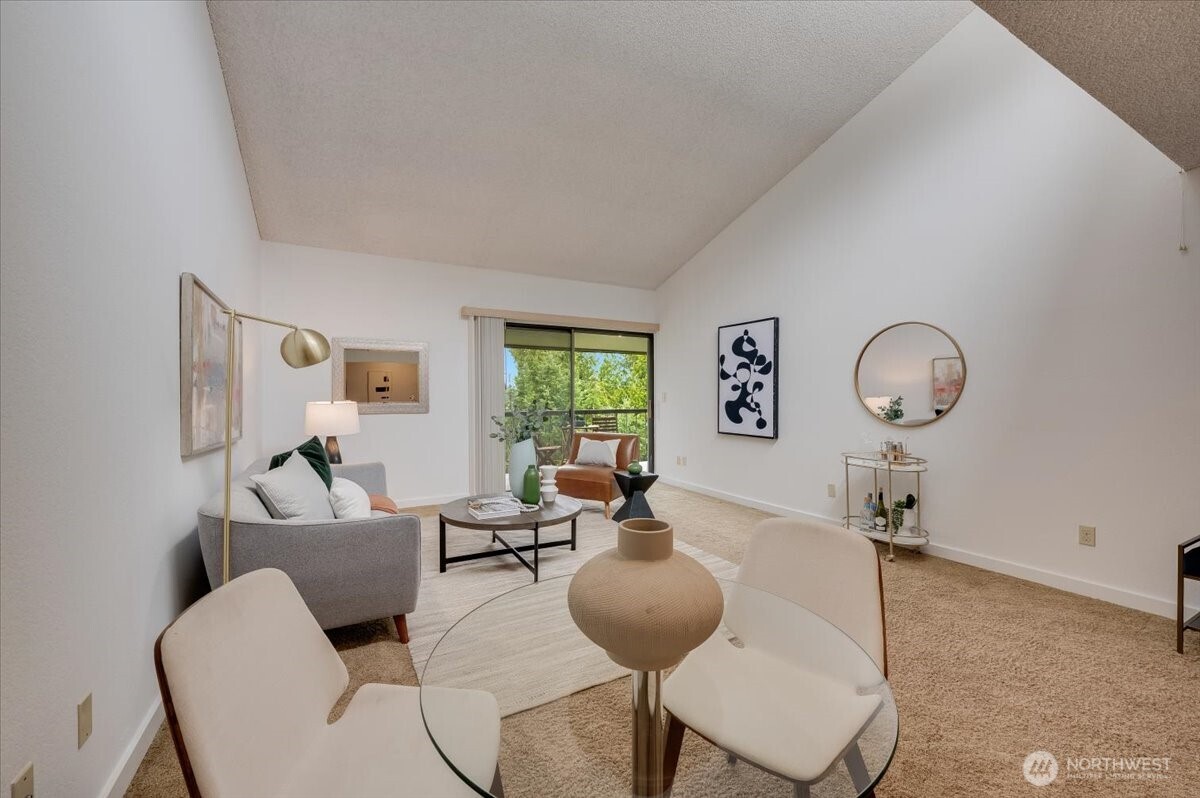 13680 Northeast 69th Street, Unit 656 Redmond, WA 98052 - Photo 12 of 33 a living room with furniture and a window