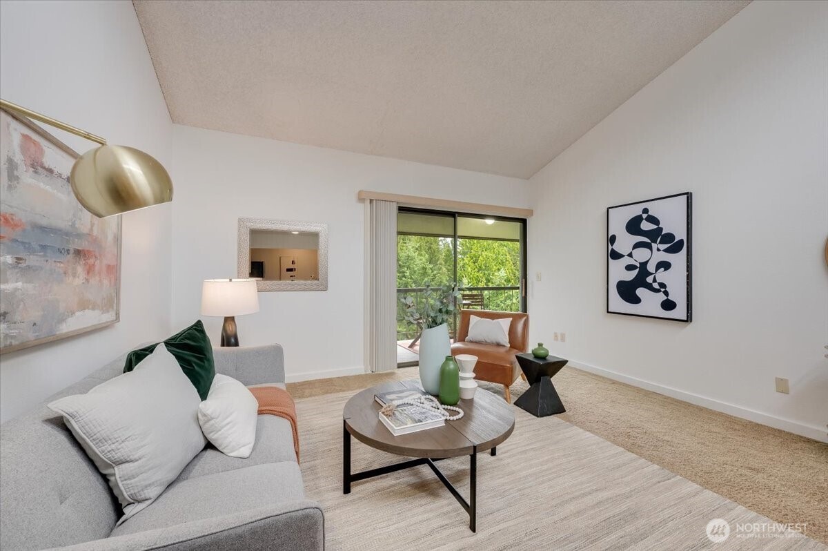 13680 Northeast 69th Street, Unit 656 Redmond, WA 98052 - Photo 15 of 33 a living room with furniture and a window