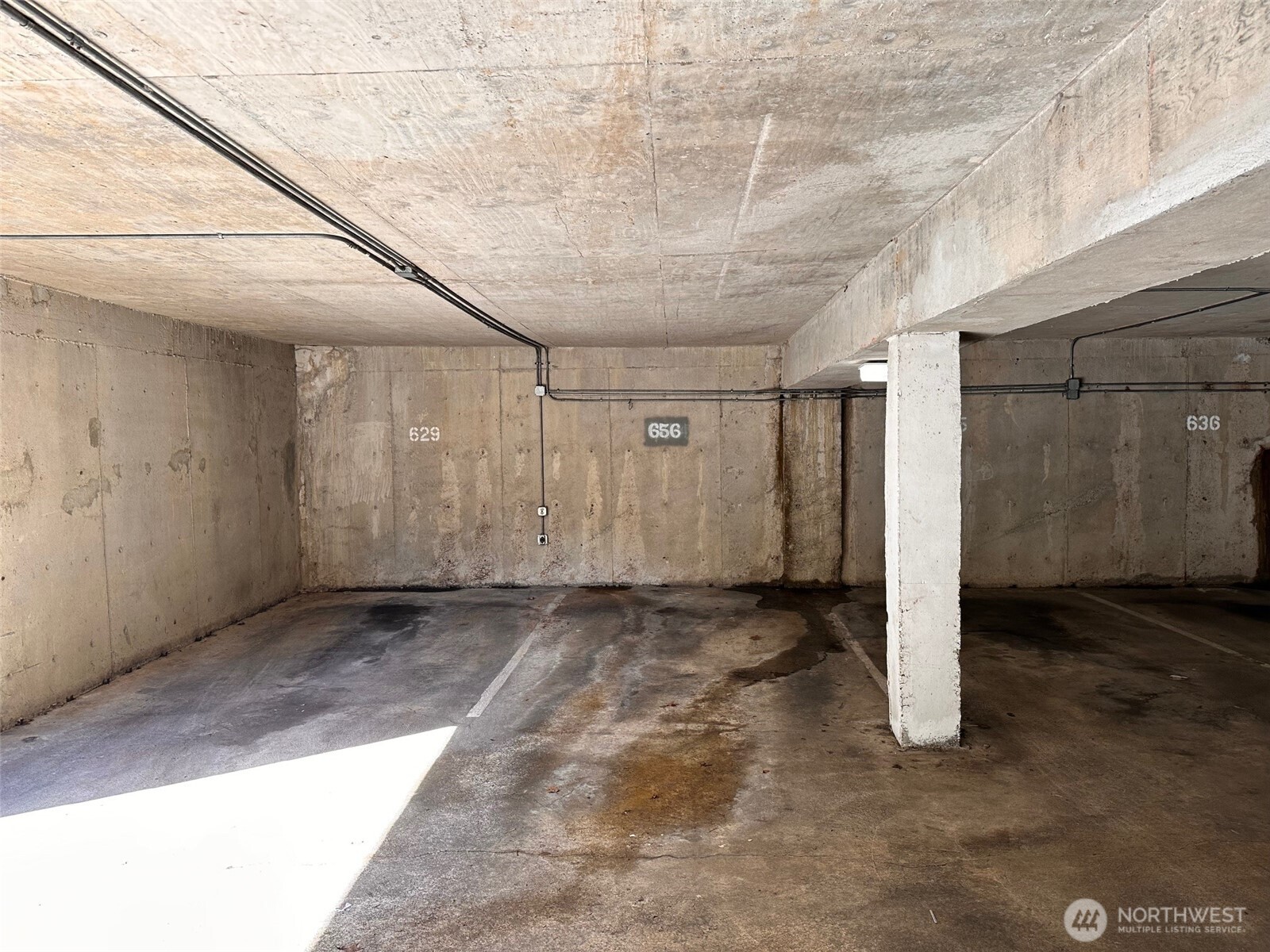 13680 Northeast 69th Street, Unit 656 Redmond, WA 98052 - Photo 25 of 33 a view of a big room with wooden walls