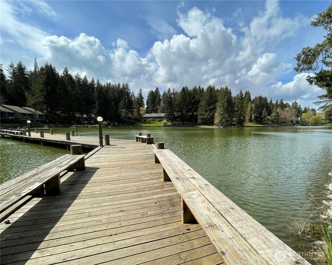 13680 Northeast 69th Street, Unit 656 Redmond, WA 98052 - Photo 27 of 33 a view of wooden floor with a lake