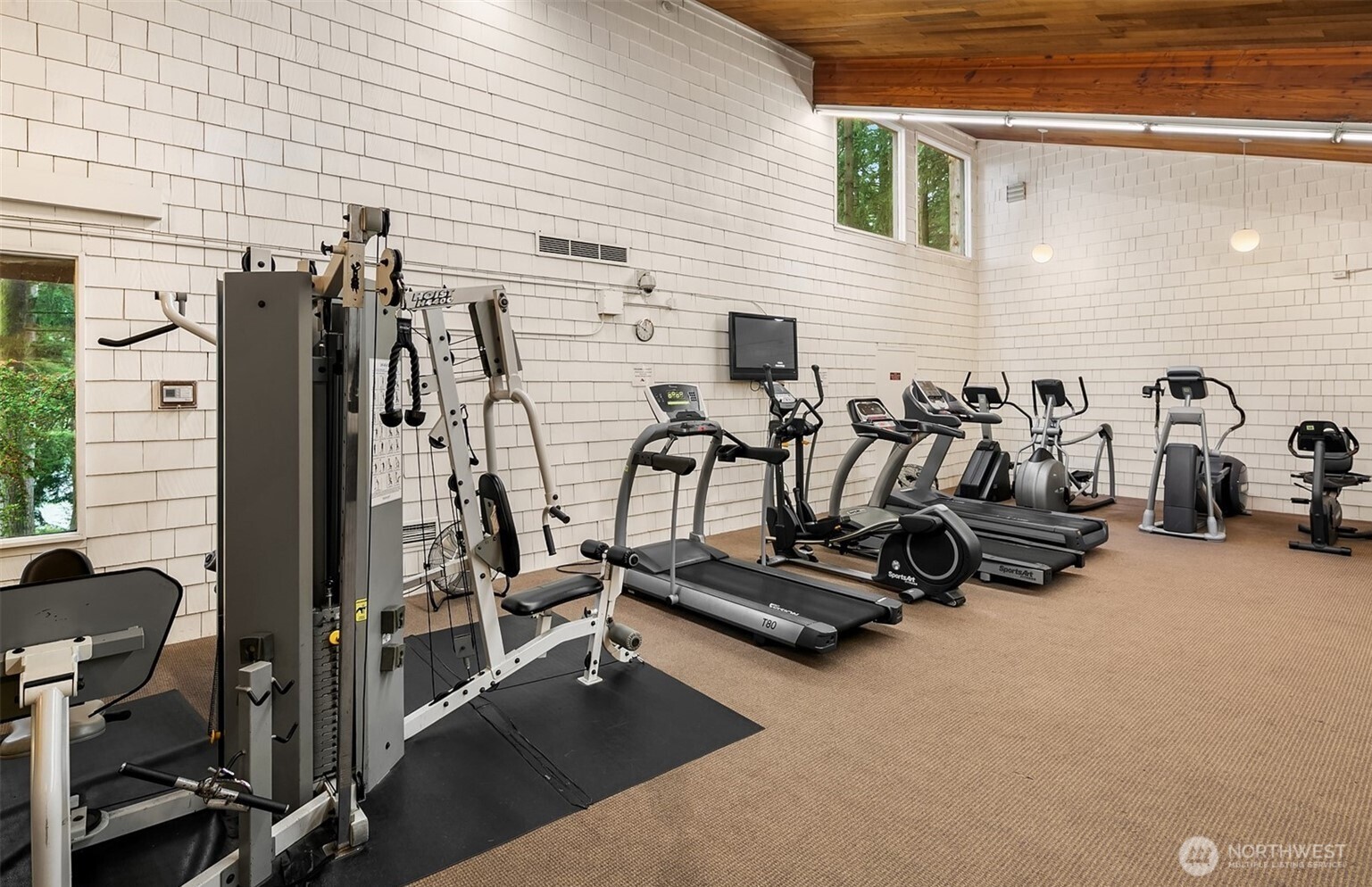 13680 Northeast 69th Street, Unit 656 Redmond, WA 98052 - Photo 28 of 33 a view of a room with gym equipment