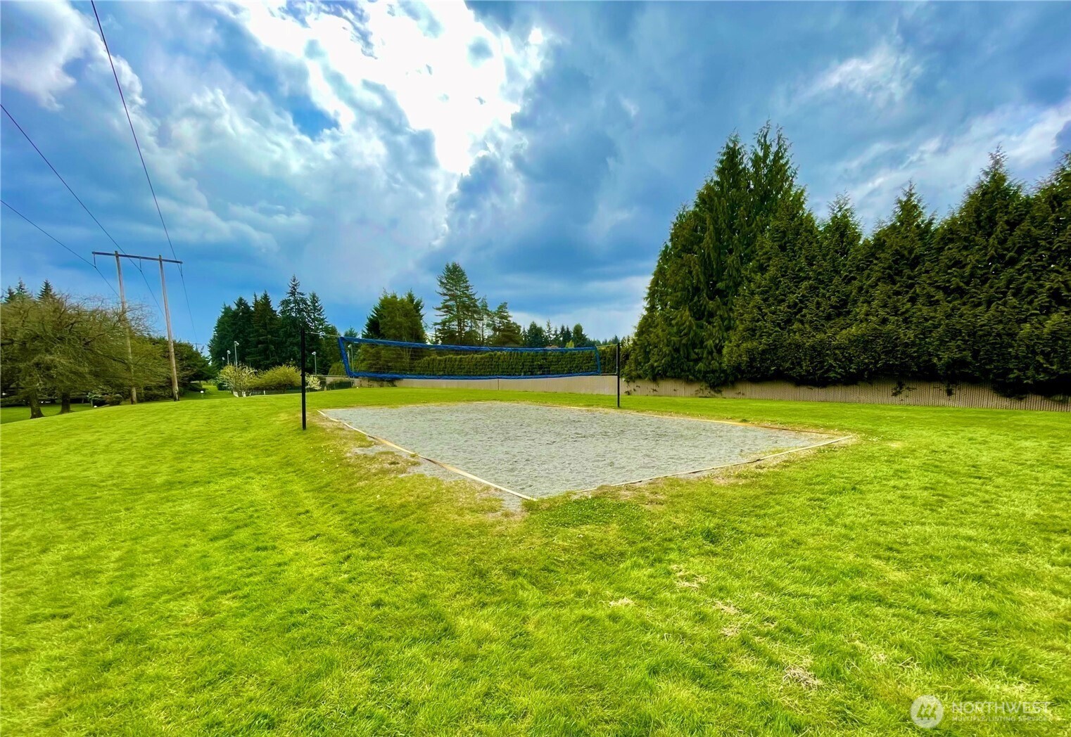 13680 Northeast 69th Street, Unit 656 Redmond, WA 98052 - Photo 32 of 33 a view of a swimming pool and a yard