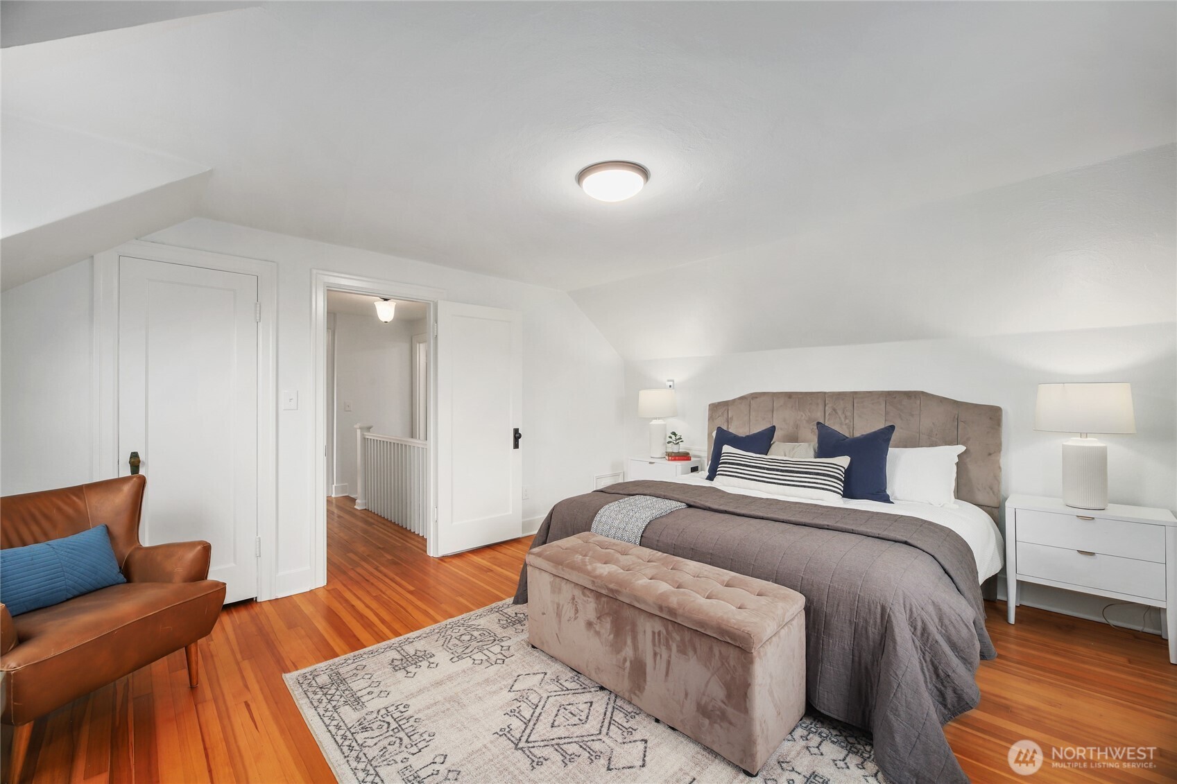 3239 45th Avenue Southwest Seattle, WA 98116 - Photo 14 of 39 a bedroom with a bed and a couch