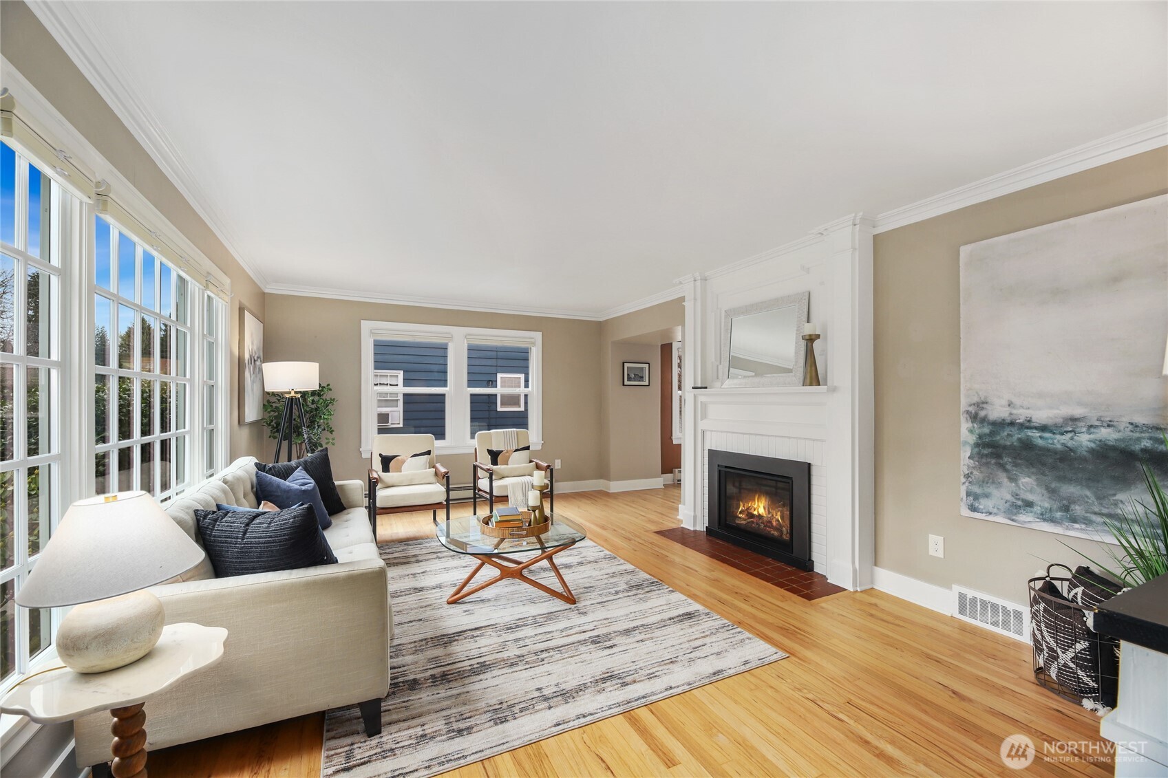 3239 45th Avenue Southwest Seattle, WA 98116 - Photo 3 of 39 a living room with furniture and a fireplace
