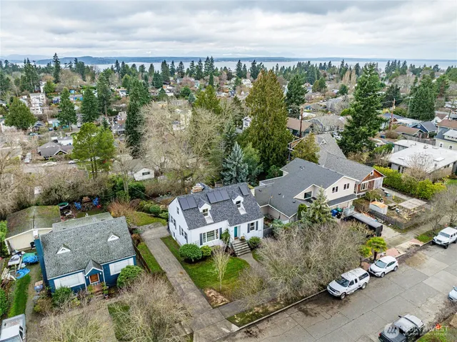 an aerial view of a house with a garden