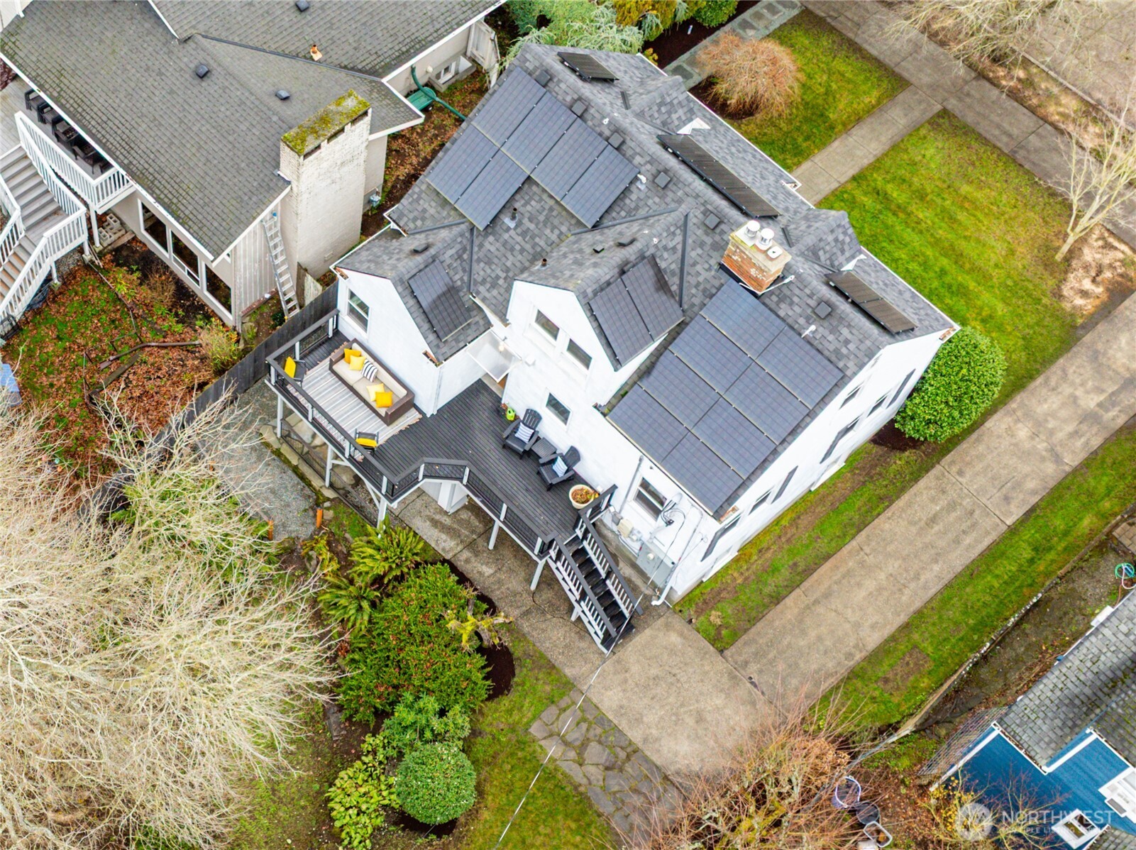 3239 45th Avenue Southwest Seattle, WA 98116 - Photo 33 of 39 an aerial view of a house with a yard