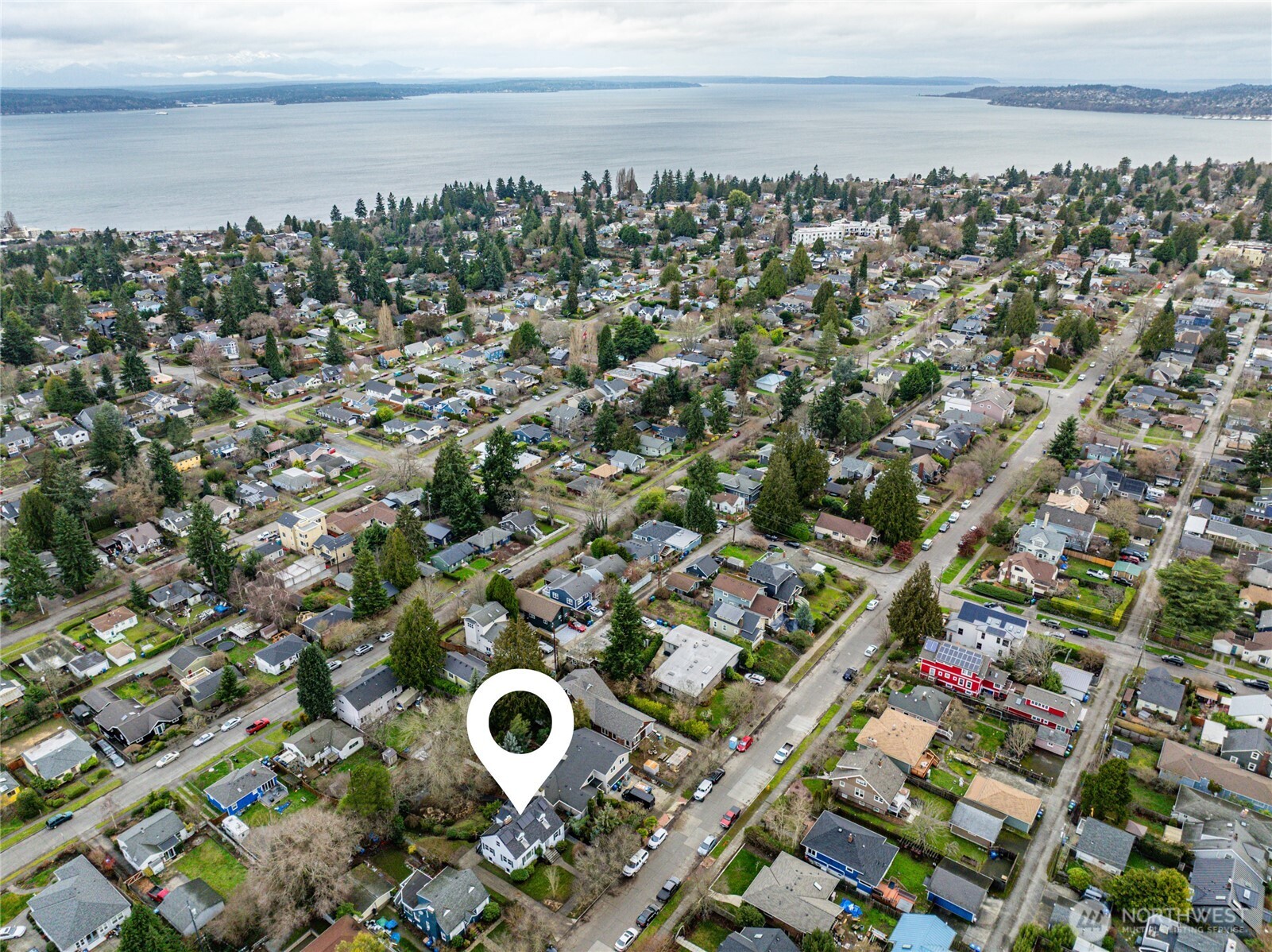 3239 45th Avenue Southwest Seattle, WA 98116 - Photo 37 of 39 an aerial view of multiple house with yard