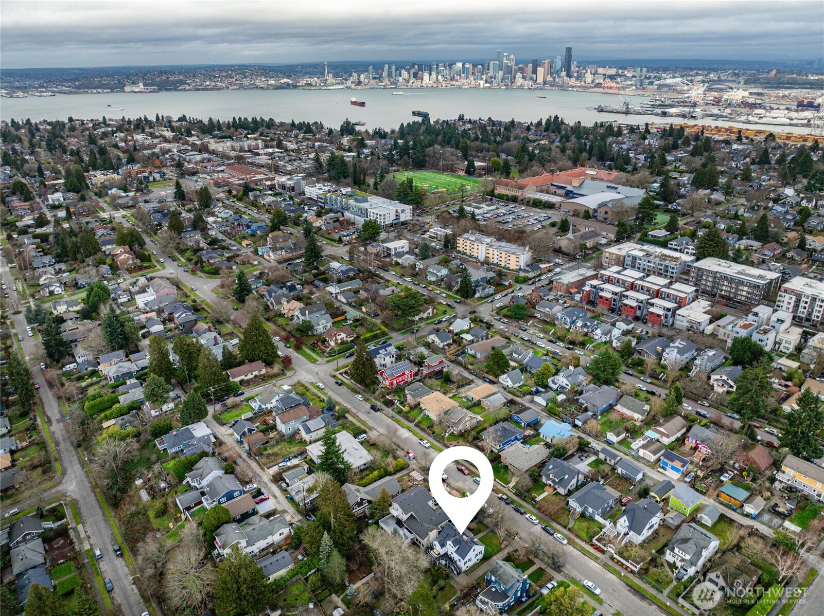 3239 45th Avenue Southwest Seattle, WA 98116 - Photo 38 of 39 an aerial view of a residential houses with city view