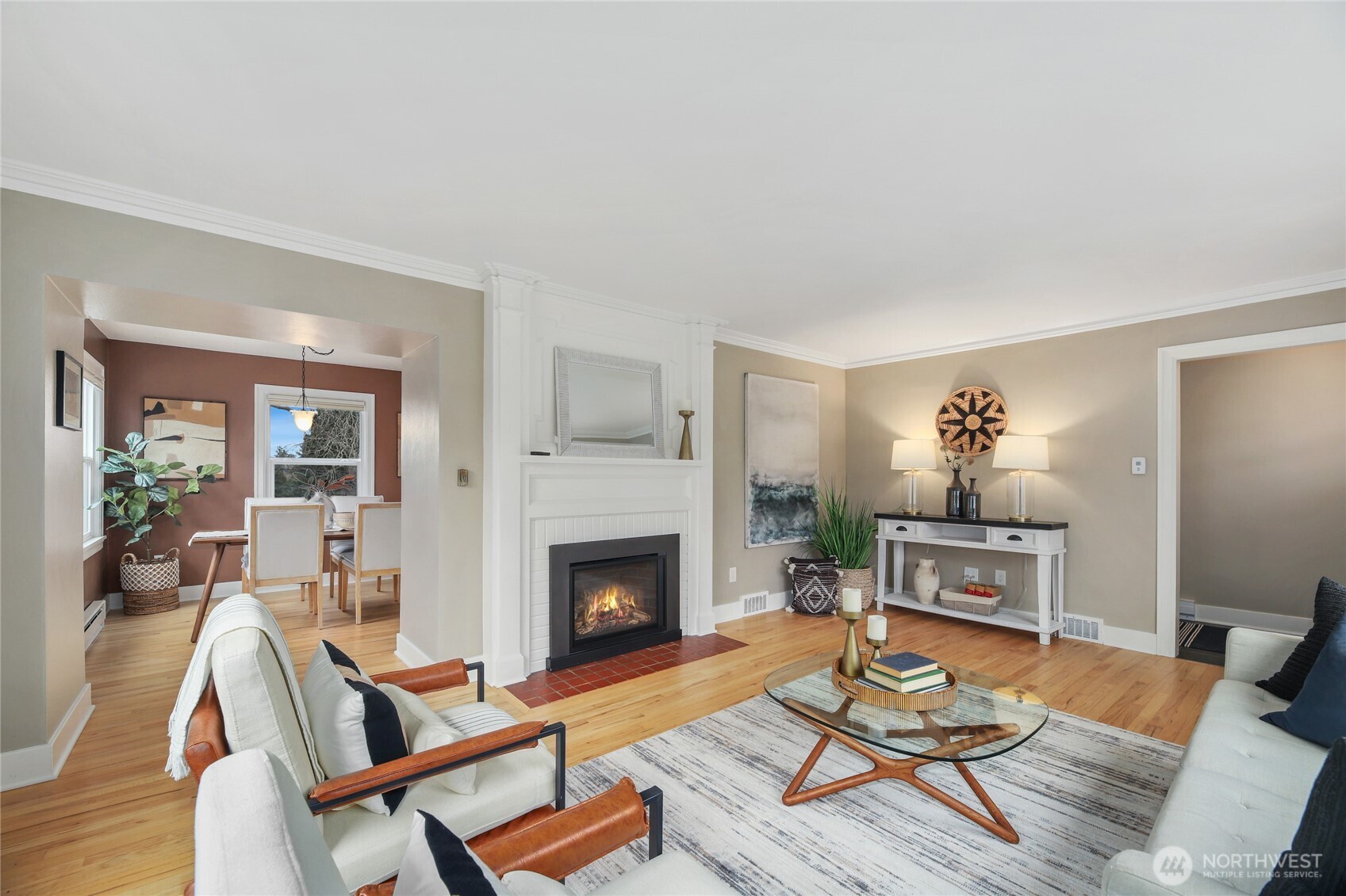 3239 45th Avenue Southwest Seattle, WA 98116 - Photo 6 of 39 a living room with furniture and a fireplace