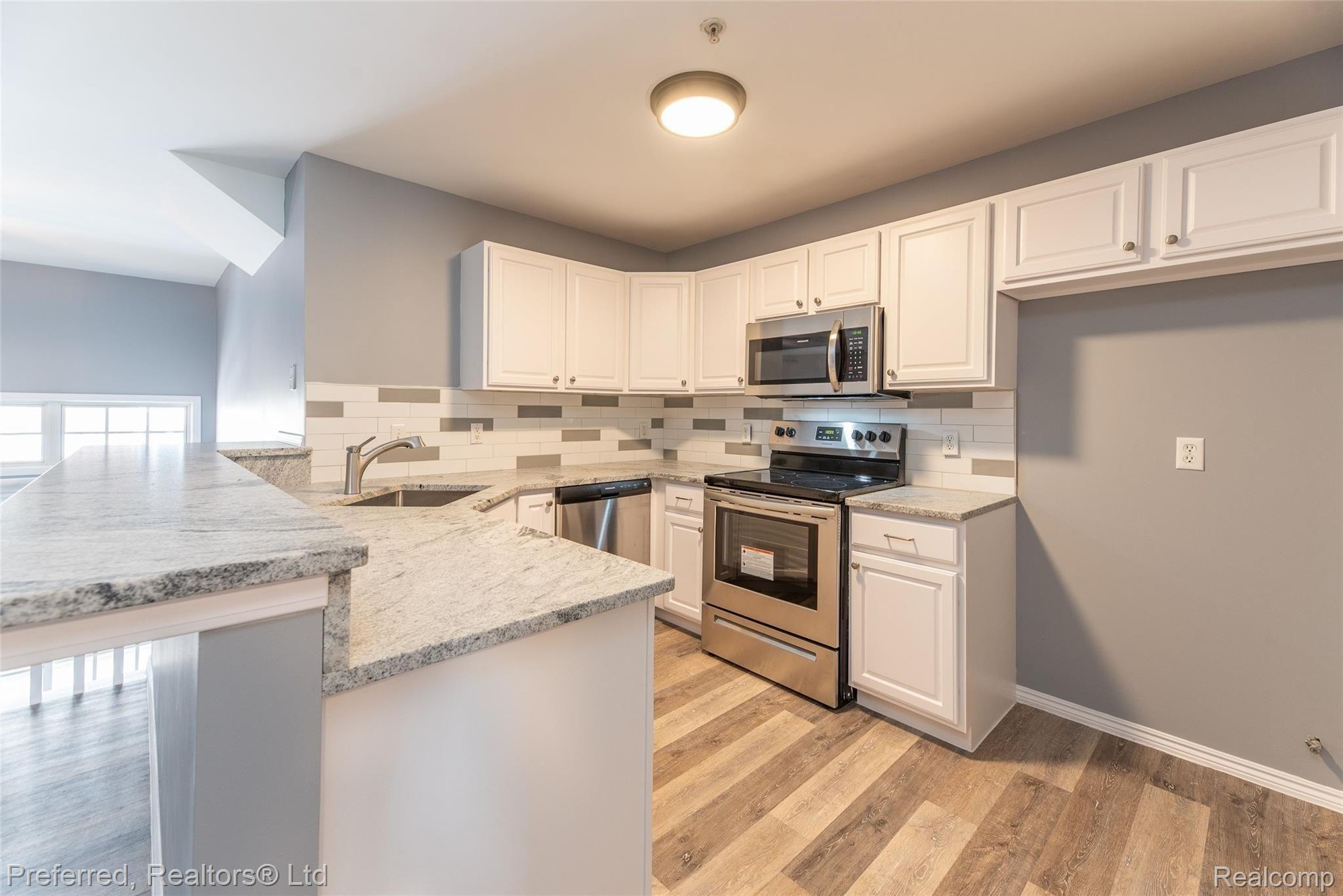 50115 Harding Street Canton, MI 48188 - Photo 8 of 26 New SS appliances and granite