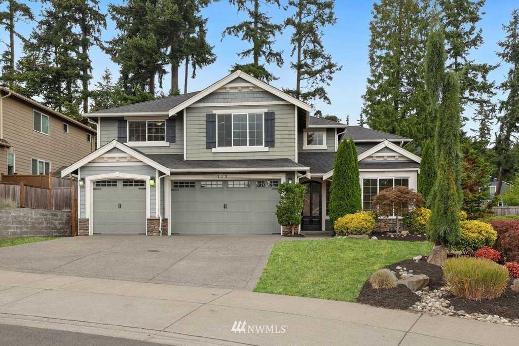 113 233rd Place Southeast Bothell, WA 98021 - Photo 1 of 39 a house view with a garden space