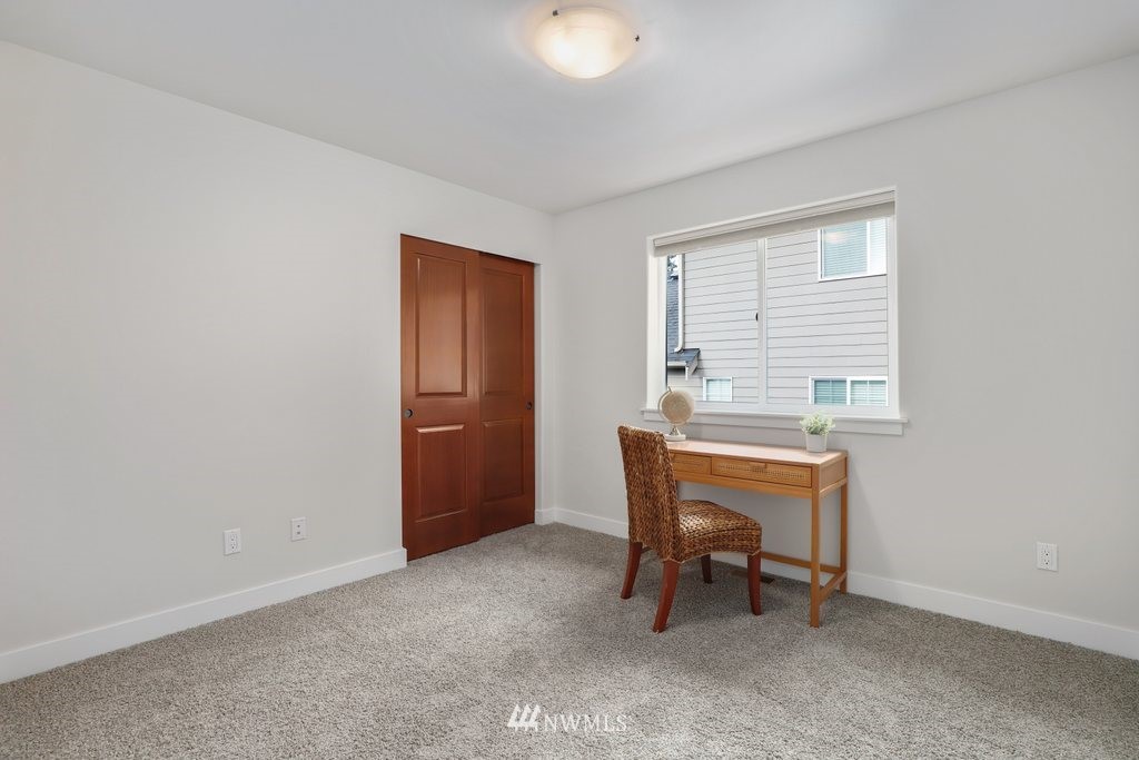 113 233rd Place Southeast Bothell, WA 98021 - Photo 17 of 39 a workspace with furniture and a window