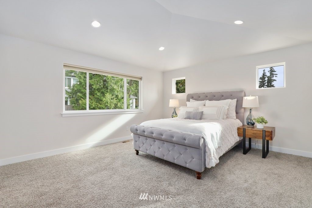 113 233rd Place Southeast Bothell, WA 98021 - Photo 20 of 39 a spacious bedroom with a bed and a window