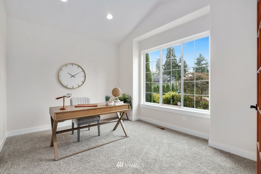 113 233rd Place Southeast Bothell, WA 98021 - Photo 4 of 39 a view of a room that has a bed and a window