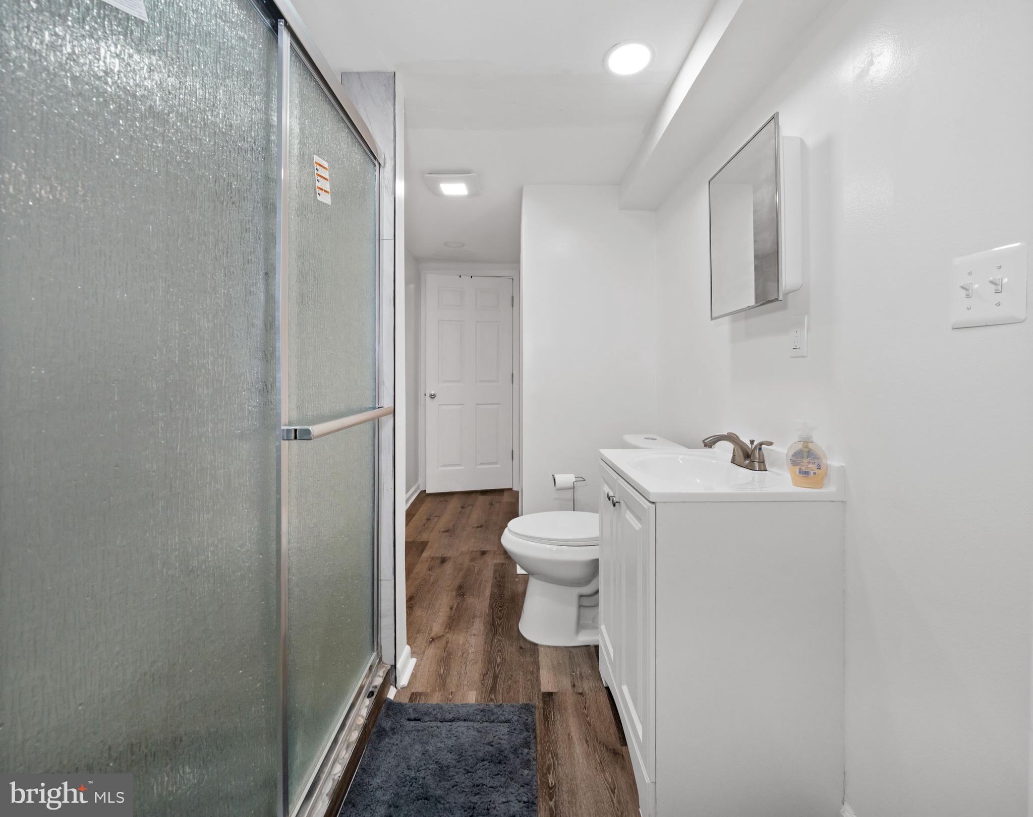 18 George Read Road New Castle, DE 19720 - Photo 32 of 40 a bathroom with a toilet and a shower