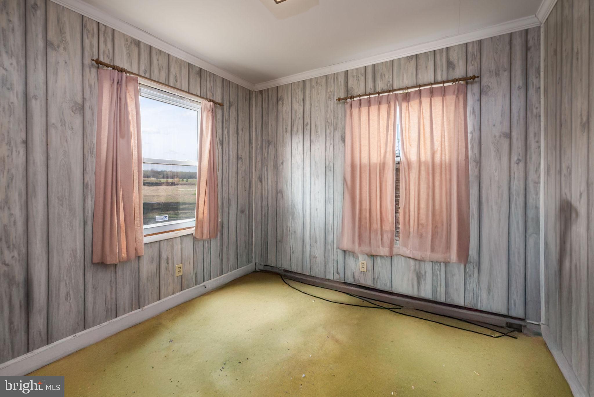29618 Armory Road Dagsboro, DE 19939 - Photo 29 of 37 a view of a room with a window and a balcony