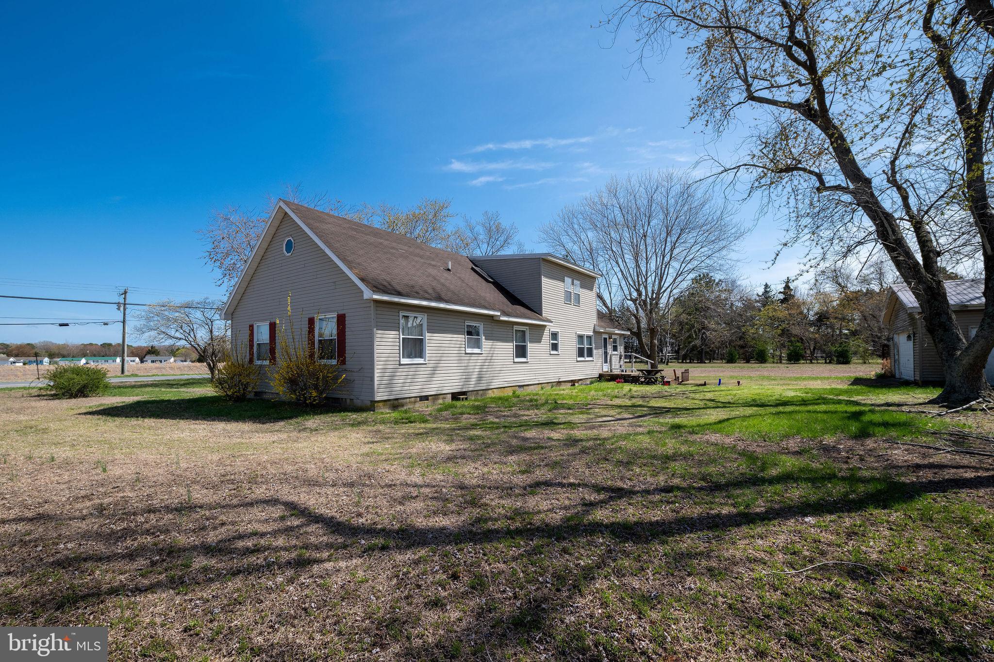 29618 Armory Road Dagsboro, DE 19939 - Photo 3 of 37 a view of a house with a yard