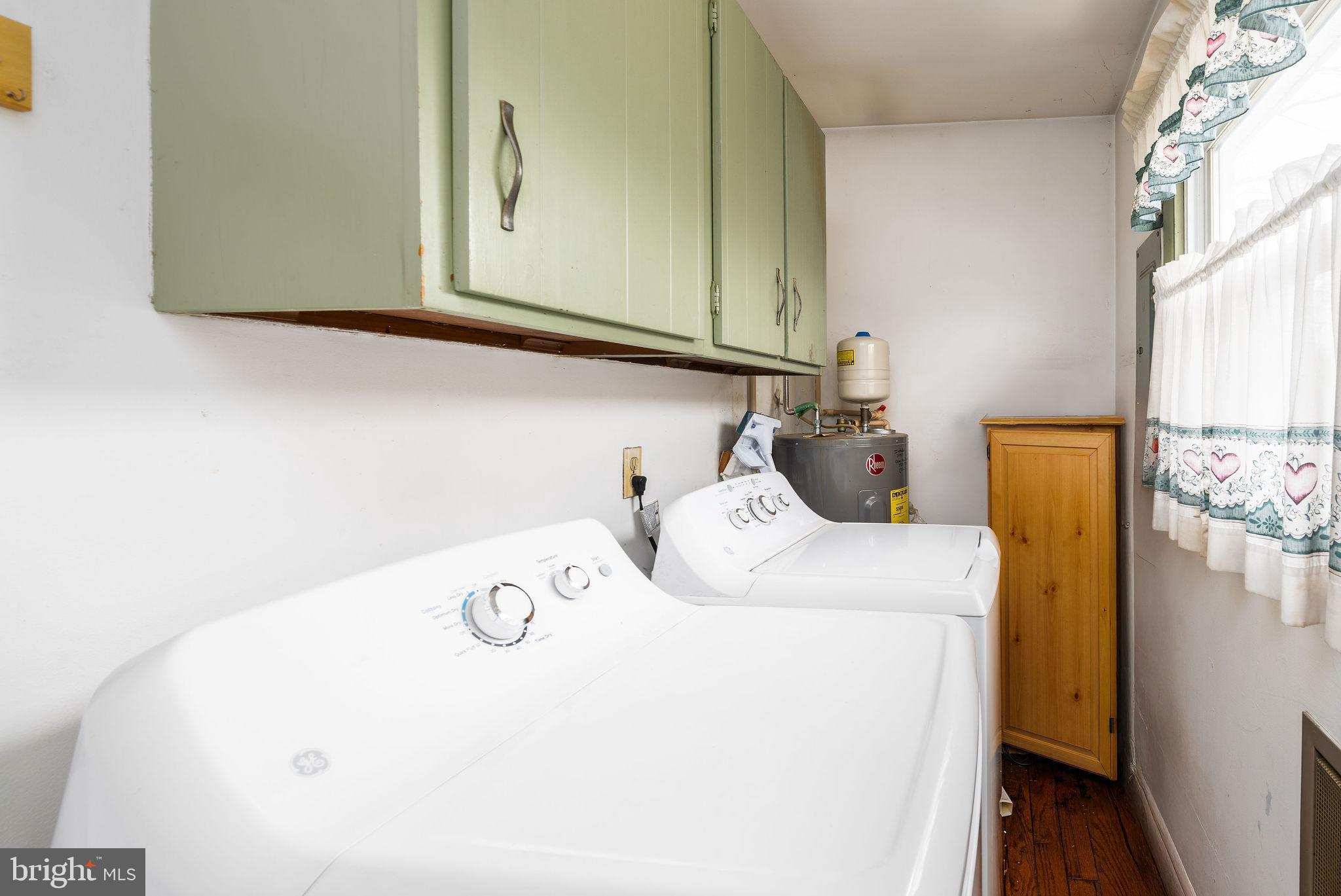 29618 Armory Road Dagsboro, DE 19939 - Photo 9 of 37 a utility room with dryer and washer