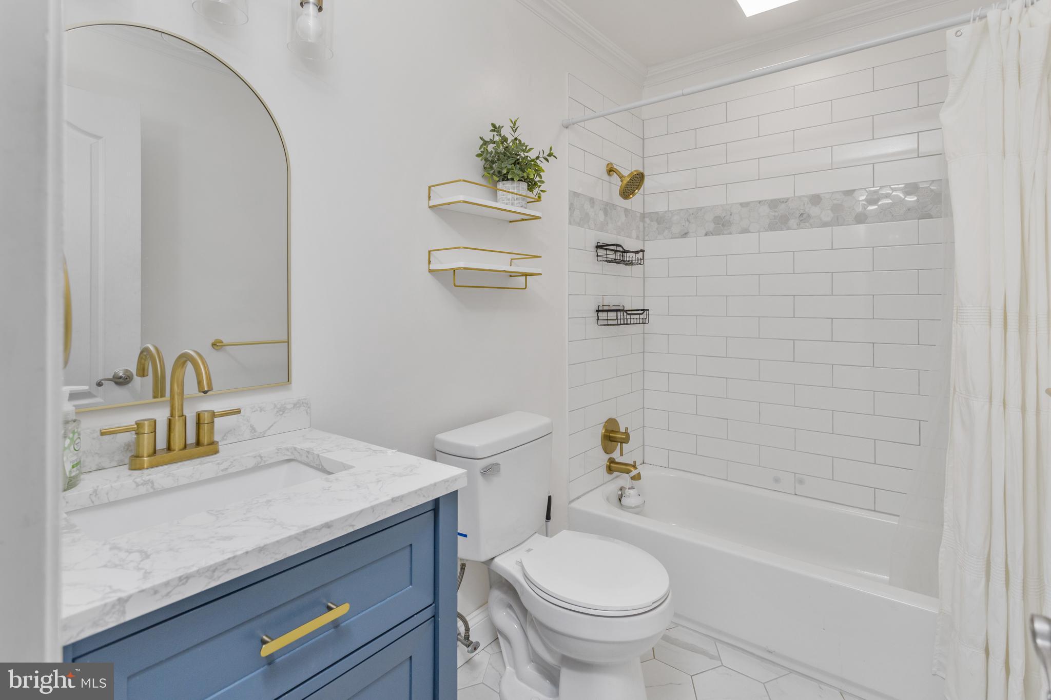 912 Silver Court Hamilton, NJ 08690 - Photo 17 of 22 a bathroom with a sink a toilet and shower