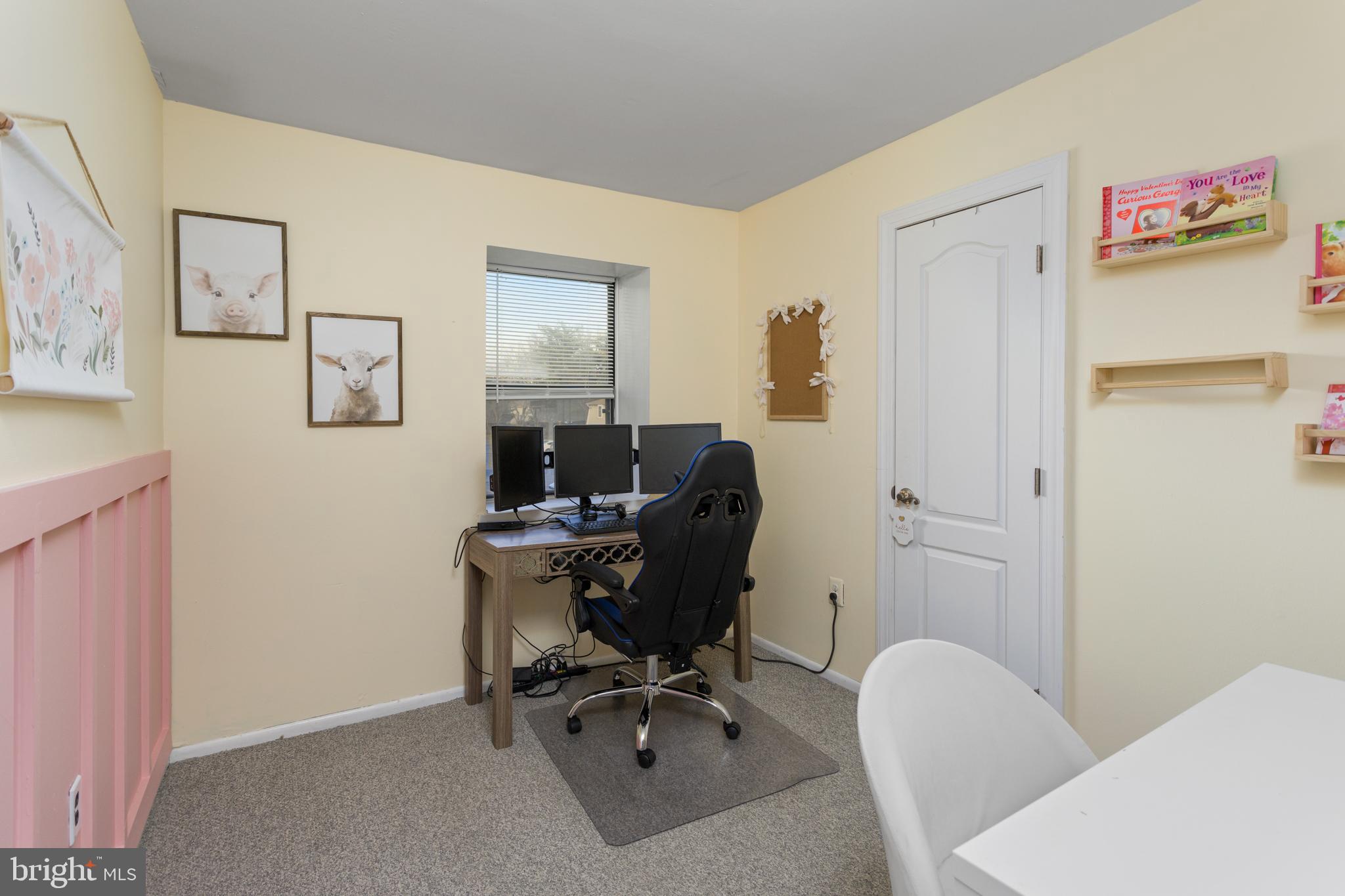 912 Silver Court Hamilton, NJ 08690 - Photo 19 of 22 a view of a workspace with furniture and a lamp