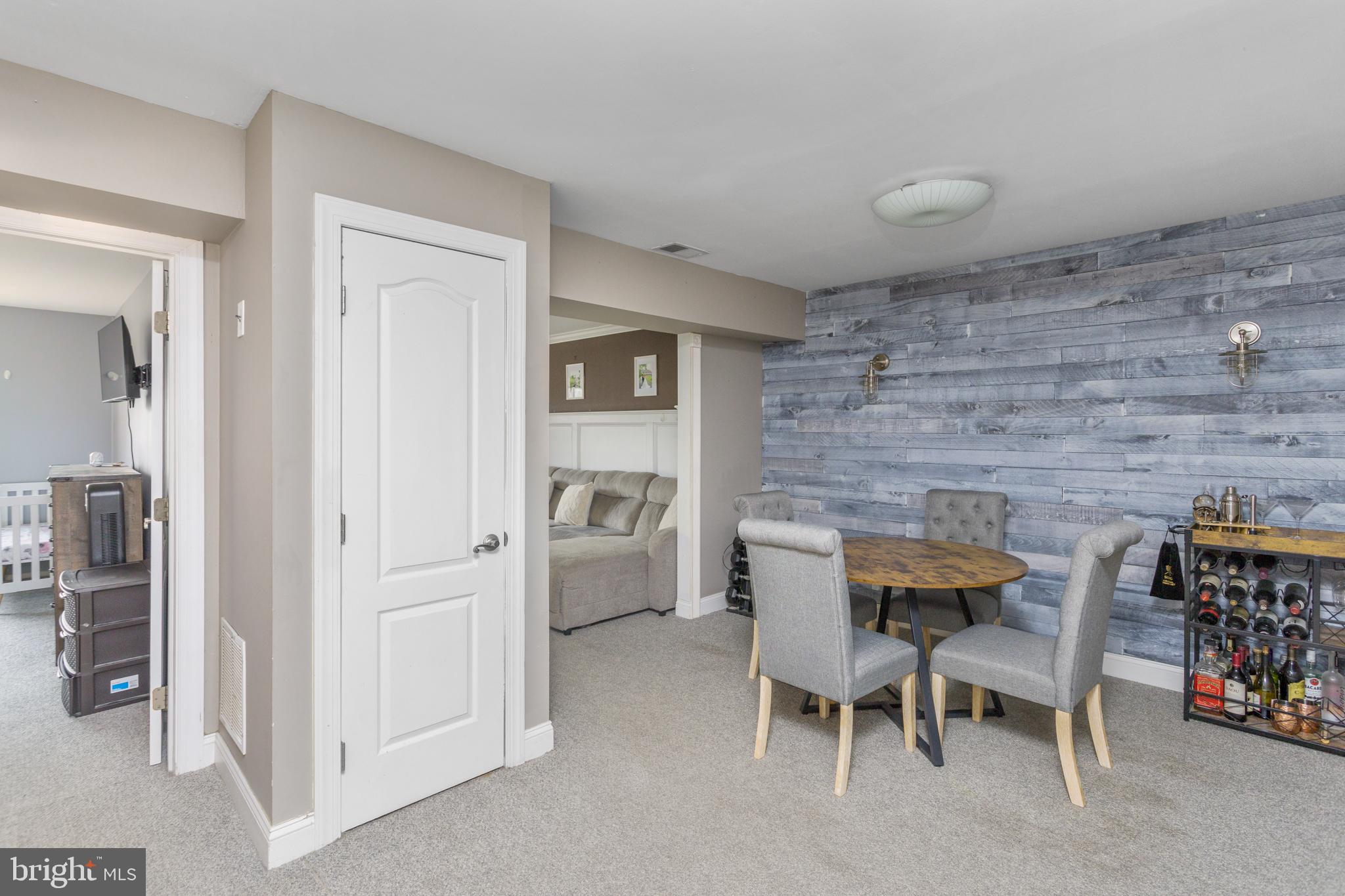 912 Silver Court Hamilton, NJ 08690 - Photo 7 of 22 a dining room with furniture and a table
