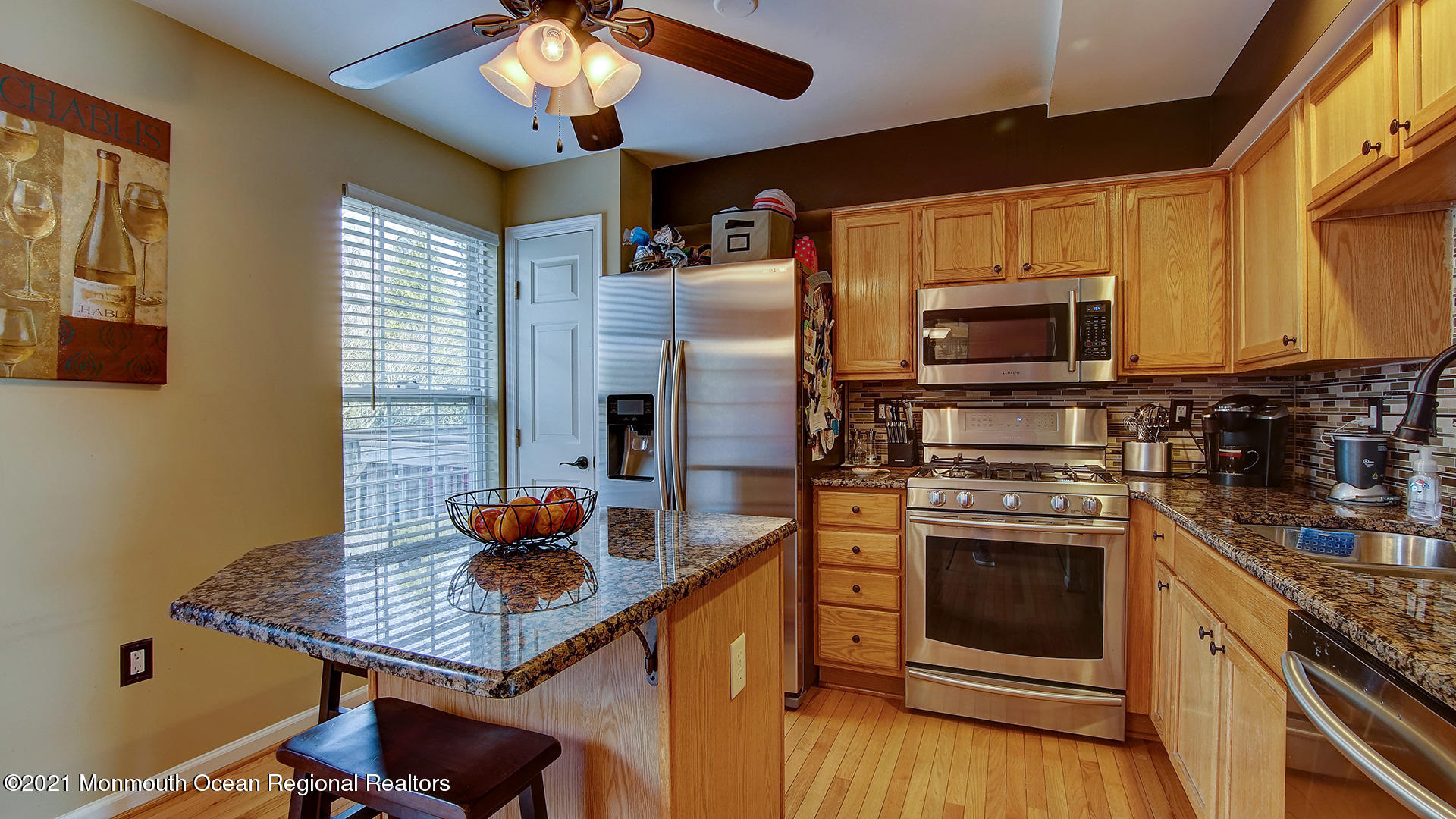 5 Abby Road Farmingdale, NJ 07727 - Photo 5 of 18 a kitchen with stainless steel appliances granite countertop a sink refrigerator stove and microwave