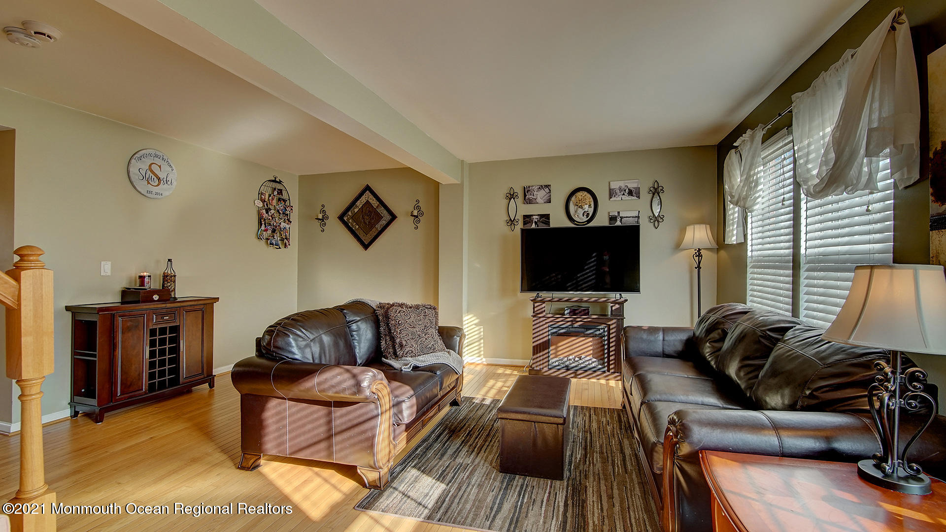 5 Abby Road Farmingdale, NJ 07727 - Photo 7 of 18 a living room with furniture and a flat screen tv