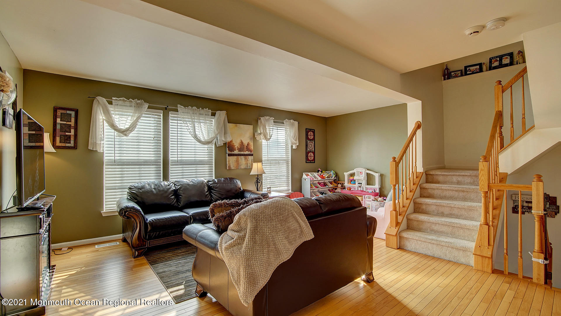 5 Abby Road Farmingdale, NJ 07727 - Photo 8 of 18 a living room with furniture and a large window