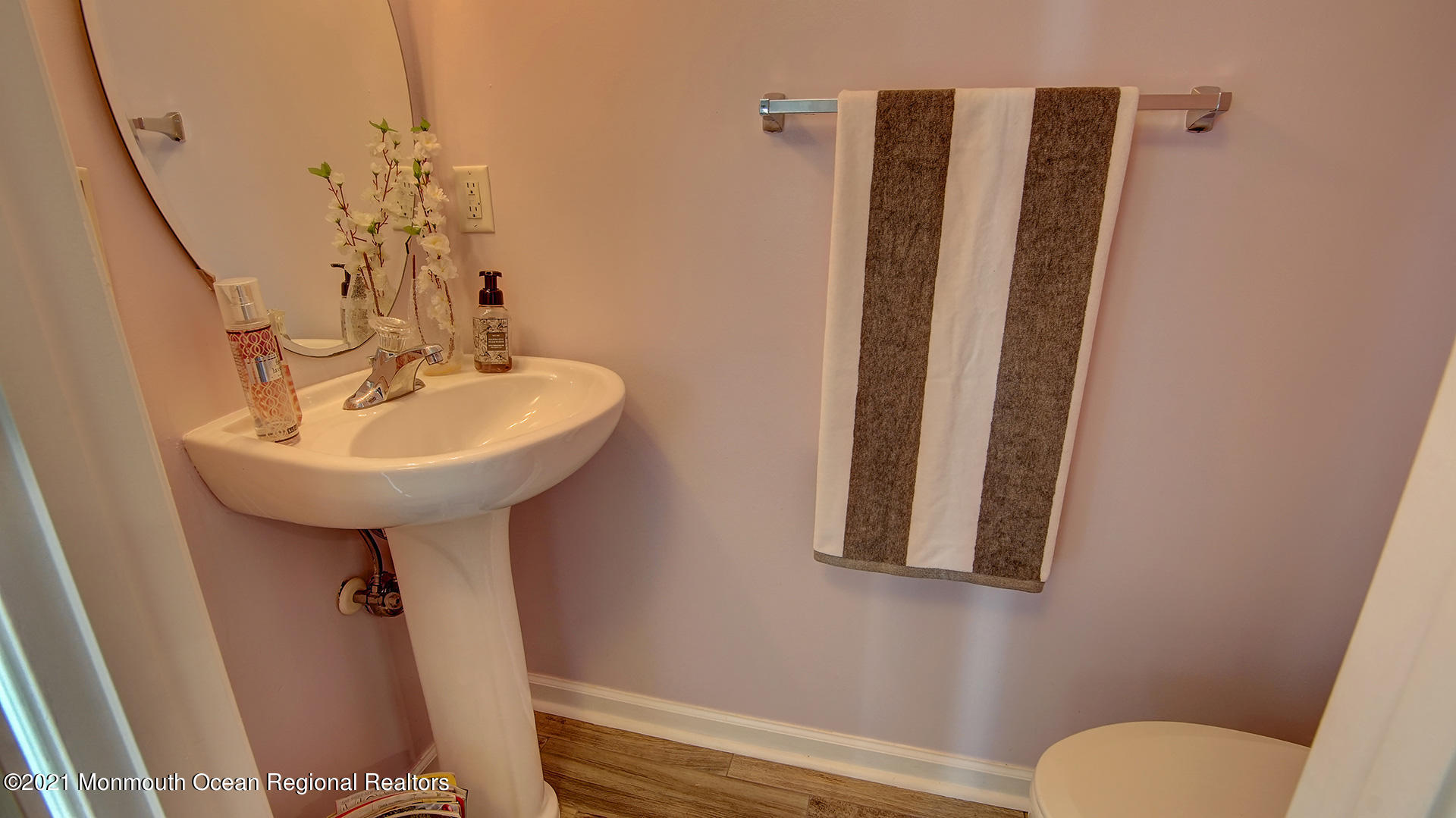 5 Abby Road Farmingdale, NJ 07727 - Photo 9 of 18 a bathroom with a sink toilet and mirror