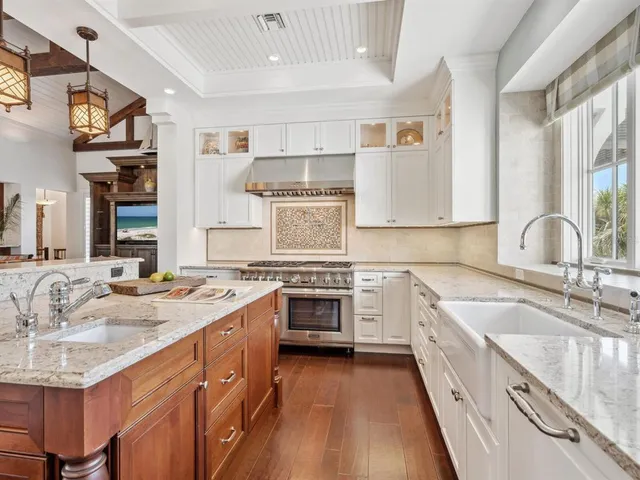 a living room with furniture a rug and a window