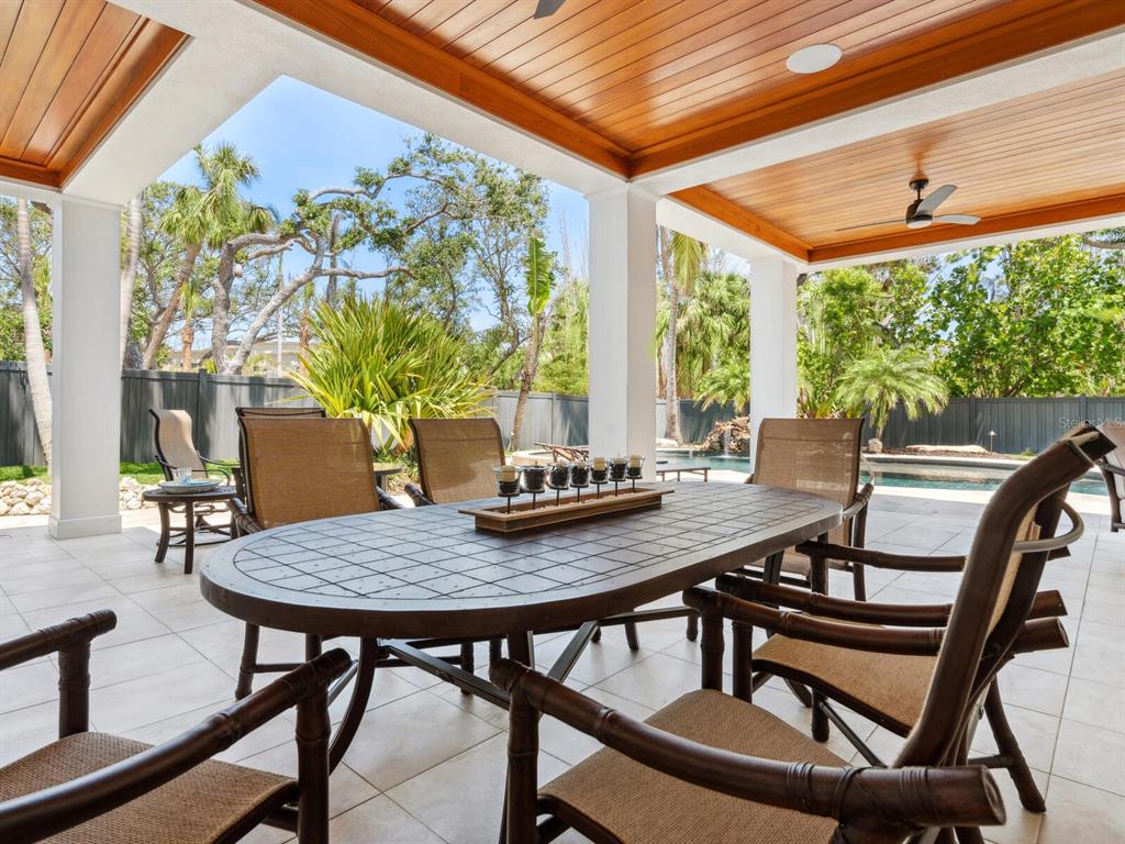 7333 Point Of Rocks Road Sarasota, FL 34242 - Photo 39 of 81 a view of a dining room with furniture window and outside view