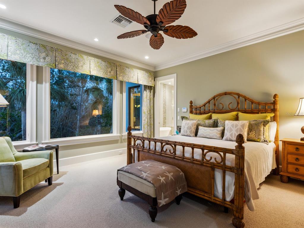 7333 Point Of Rocks Road Sarasota, FL 34242 - Photo 68 of 81 a bedroom with furniture and a window