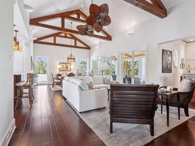 a kitchen with a sink stove top oven and cabinets