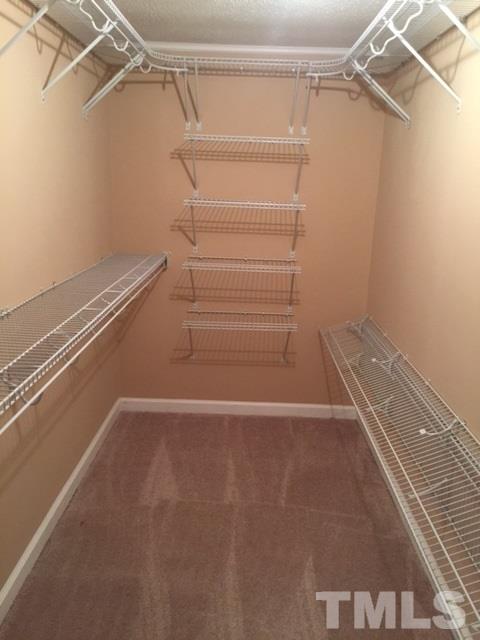 1390 Langdon Road Angier, NC 27501 - Photo 17 of 24 a view of a room with racks on the wall